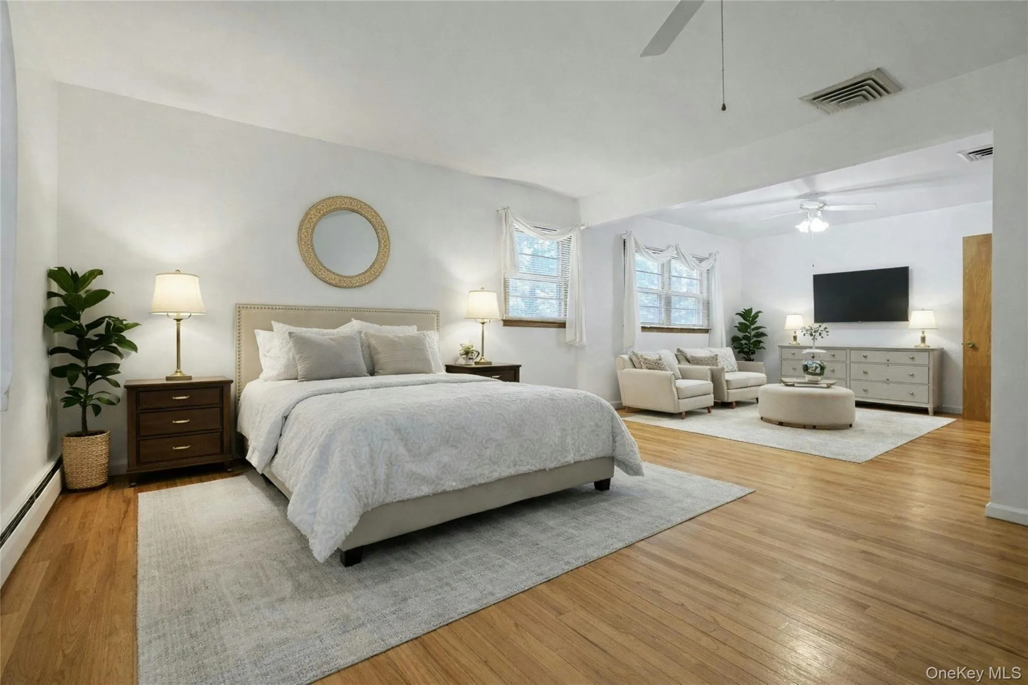 The Primary Bedroom and Sitting Room transformed with Virtual Staging. Simply beautiful and inviting! The Primary Bedroom and Sitting Room transformed with Virtual Staging. Simply beautiful and inviting!