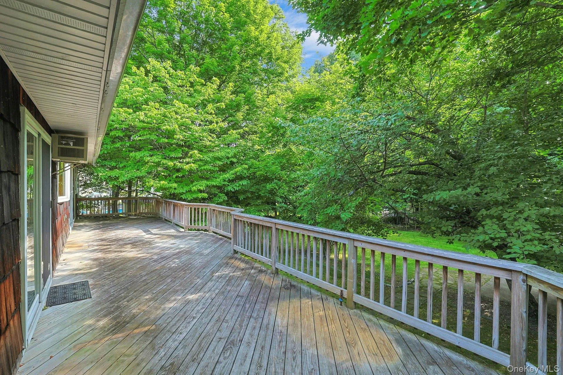 Expansive deck runs almost the length of the house. There's also a natural gas line for a grill. Expansive deck runs almost the length of the house. There's also a natural gas line for a grill.