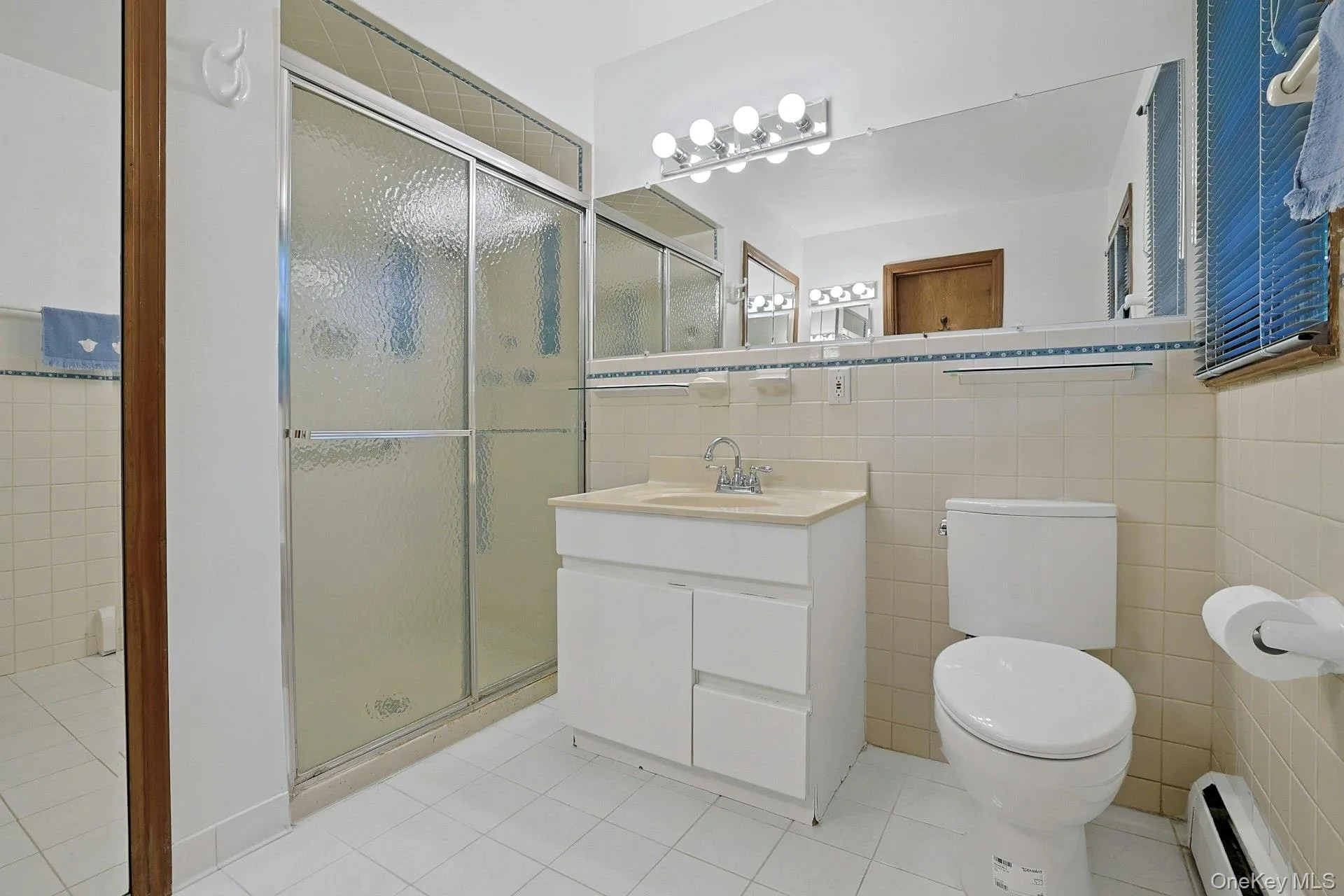 This is not the original bath; it was changed many years ago. There's a built-in linen closet and walk-in shower. This is not the original bath; it was changed many years ago. There's a built-in linen closet and walk-in shower.