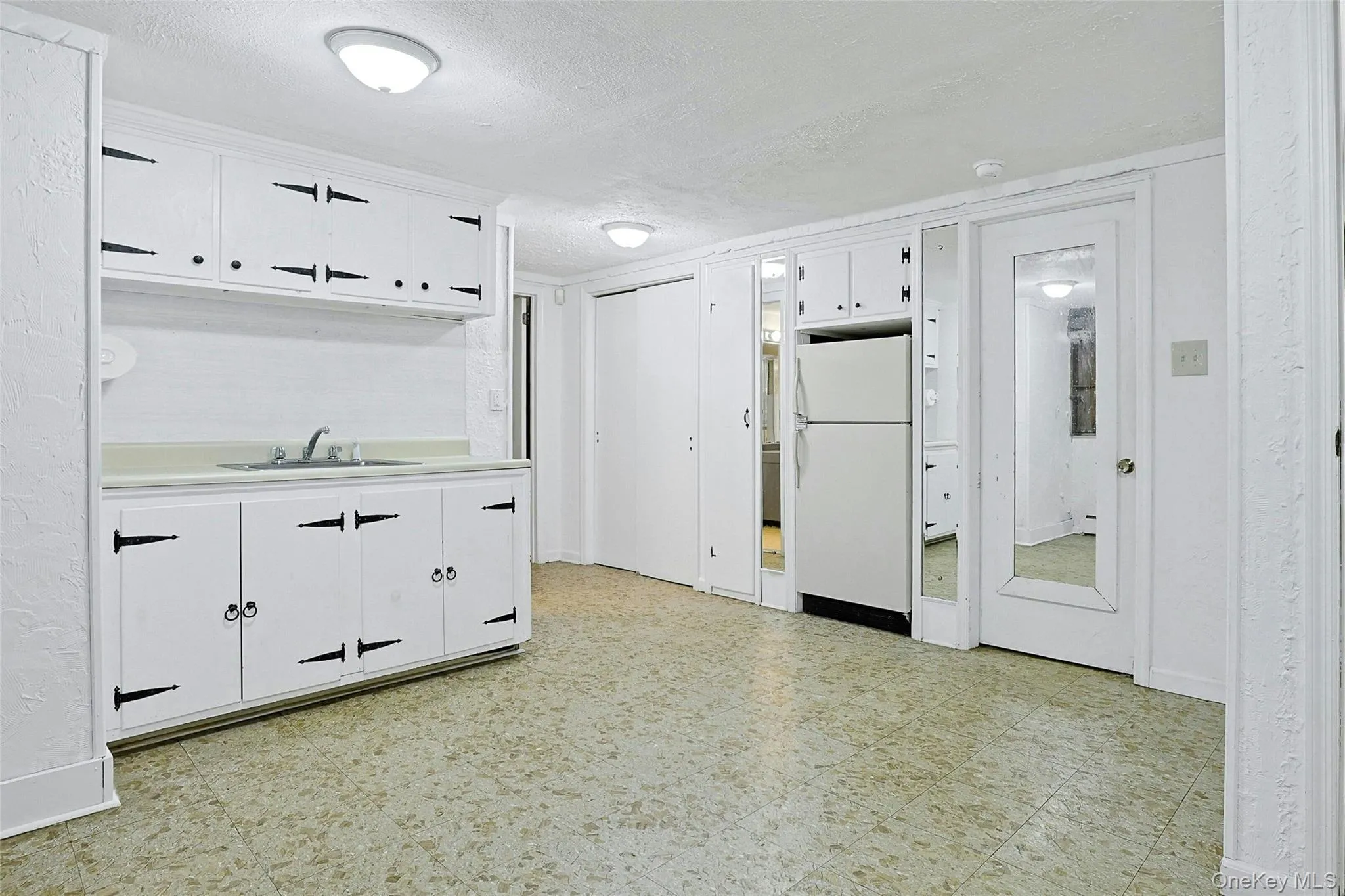 The refrigerator is older and "as is." It is included with the sale. The refrigerator is older and "as is." It is included with the sale.