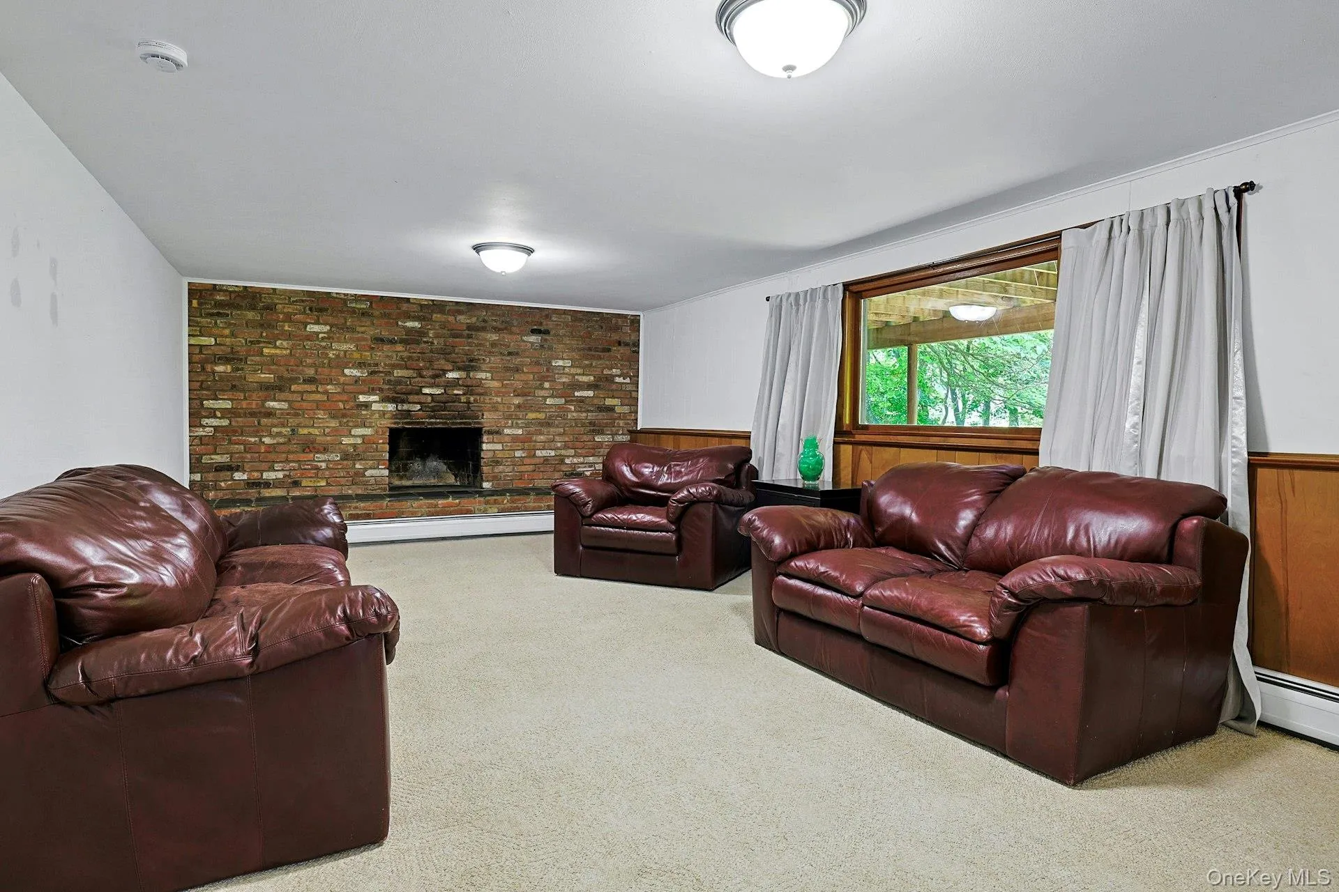 This room can be a 2nd Family Room or a Recreation Room, as first shown. The fireplace here is wood-burning. This room can be a 2nd Family Room or a Recreation Room, as first shown. The fireplace here is wood-burning.