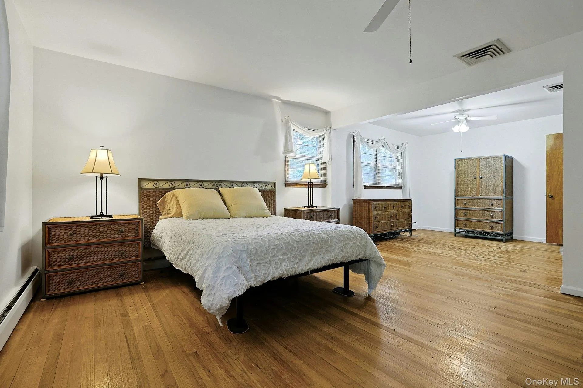 The Primary Bedroom and sitting room with its existing furniture. The Primary Bedroom and sitting room with its existing furniture.