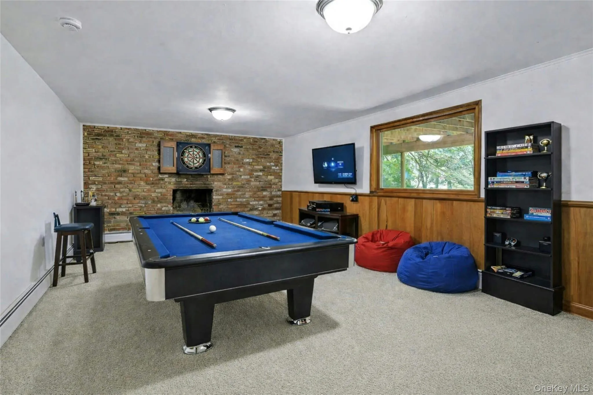 Lower Level Family Room Virtually Staged as a Game Room. A fun room to have! Lower Level Family Room Virtually Staged as a Game Room. A fun room to have!
