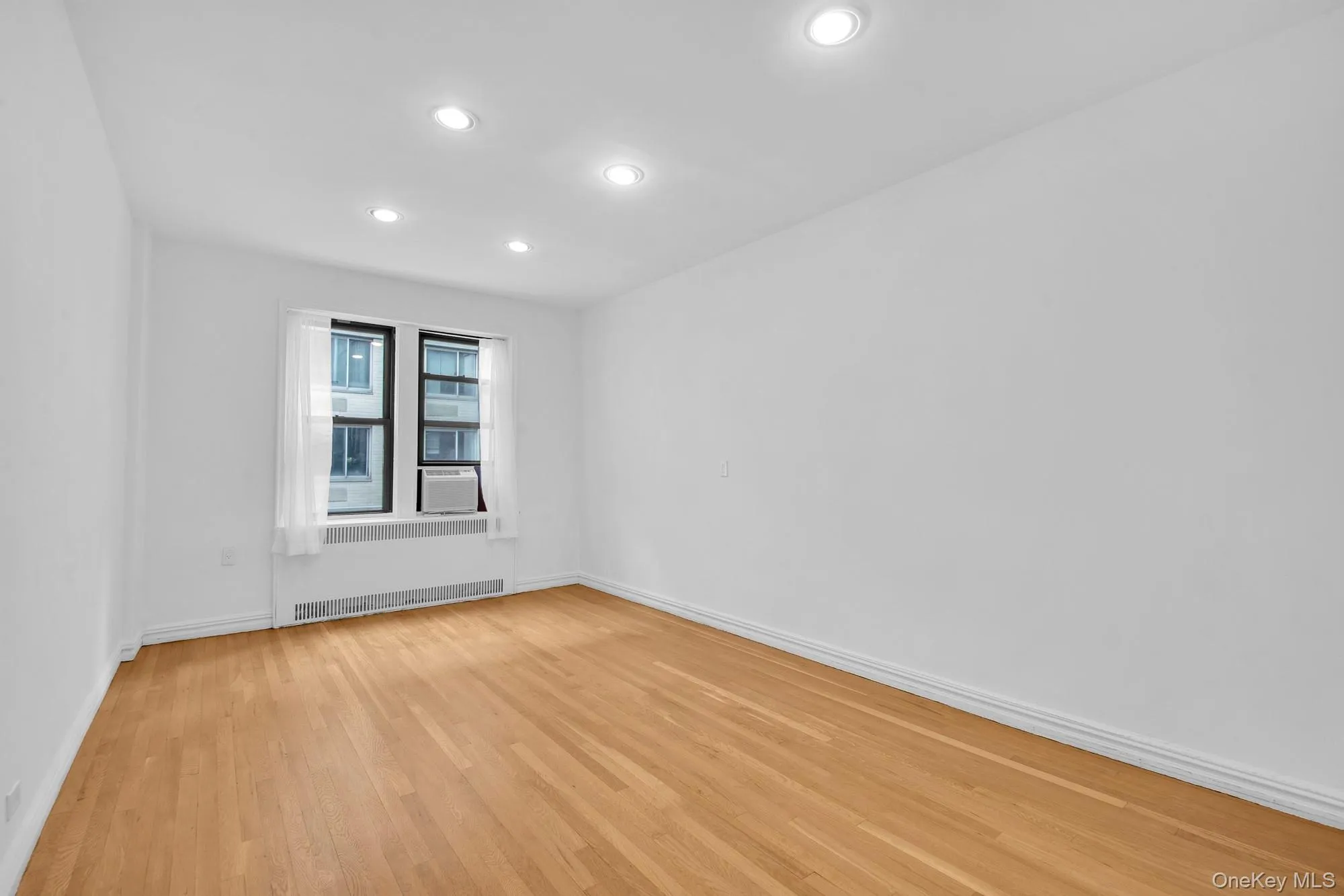 Featuring hardwood floor and ample closet space Featuring hardwood floor and ample closet space