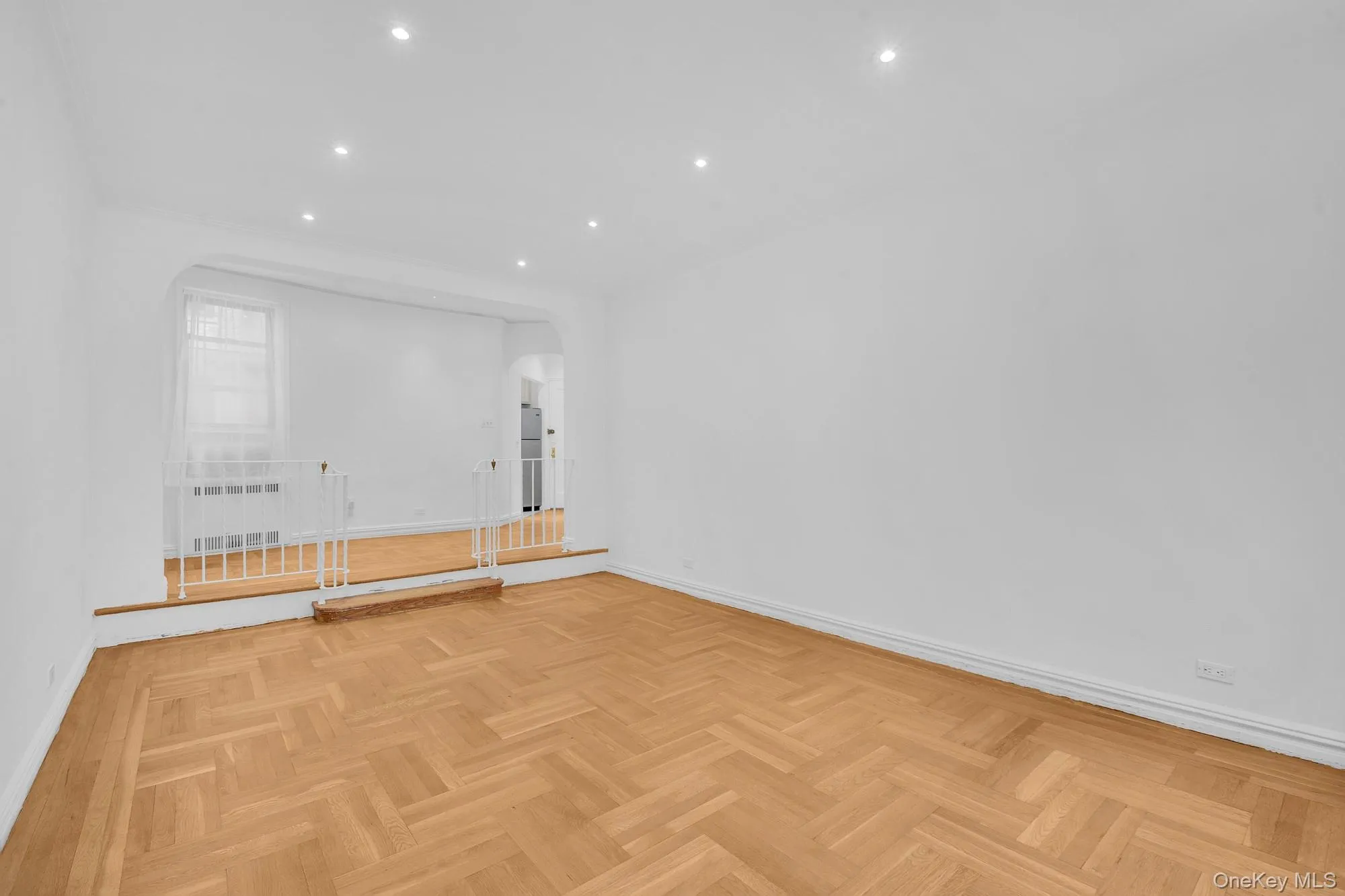 Sunken living room with hardwood floors. Sunken living room with hardwood floors.