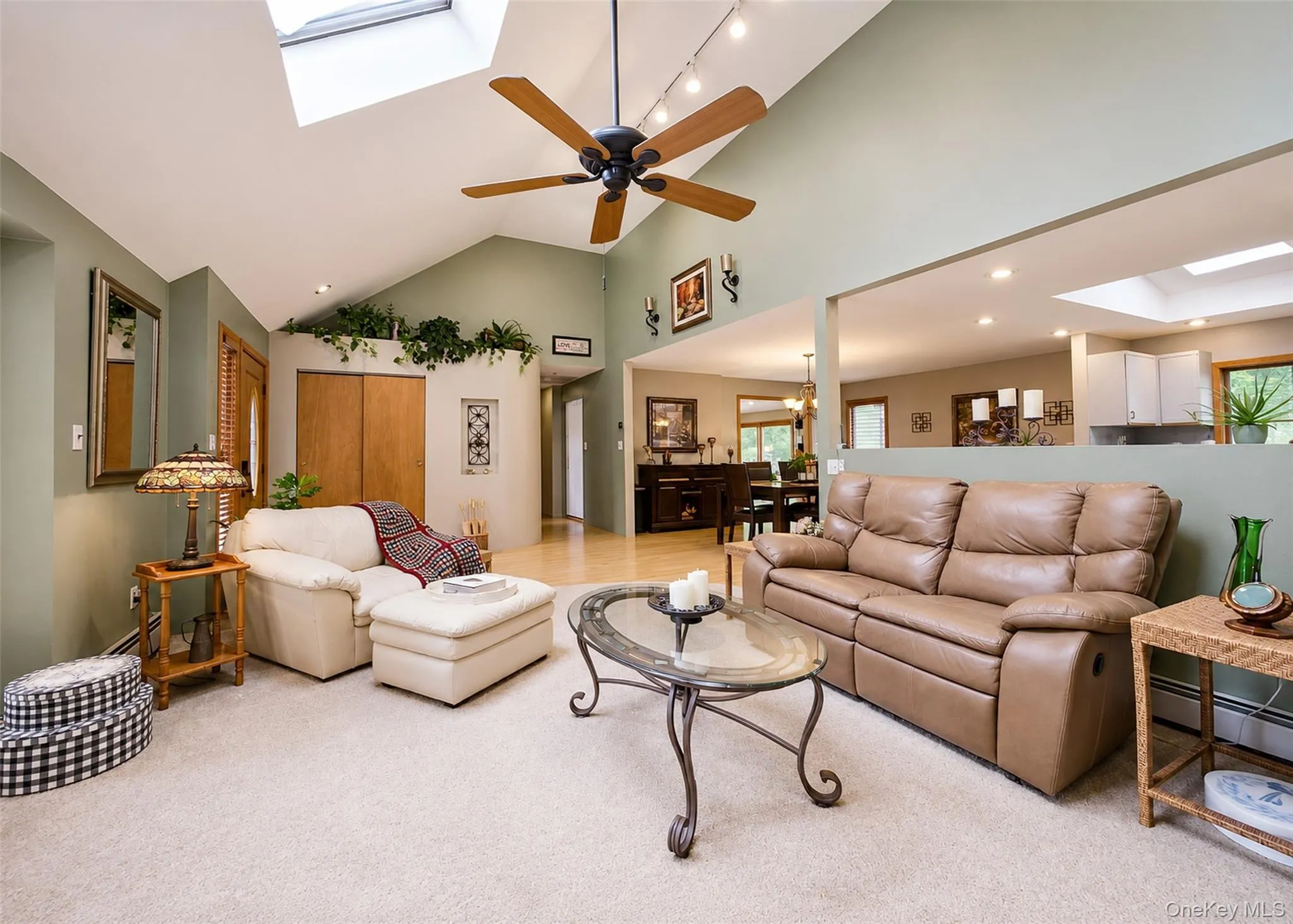 Front entry with large closet, Open concept living rm Front entry with large closet, Open concept living rm