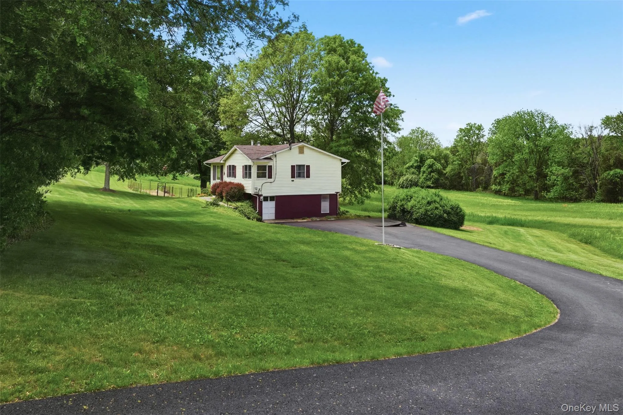 A newly paved driveway leads to your 2-car garage and home. A newly paved driveway leads to your 2-car garage and home.