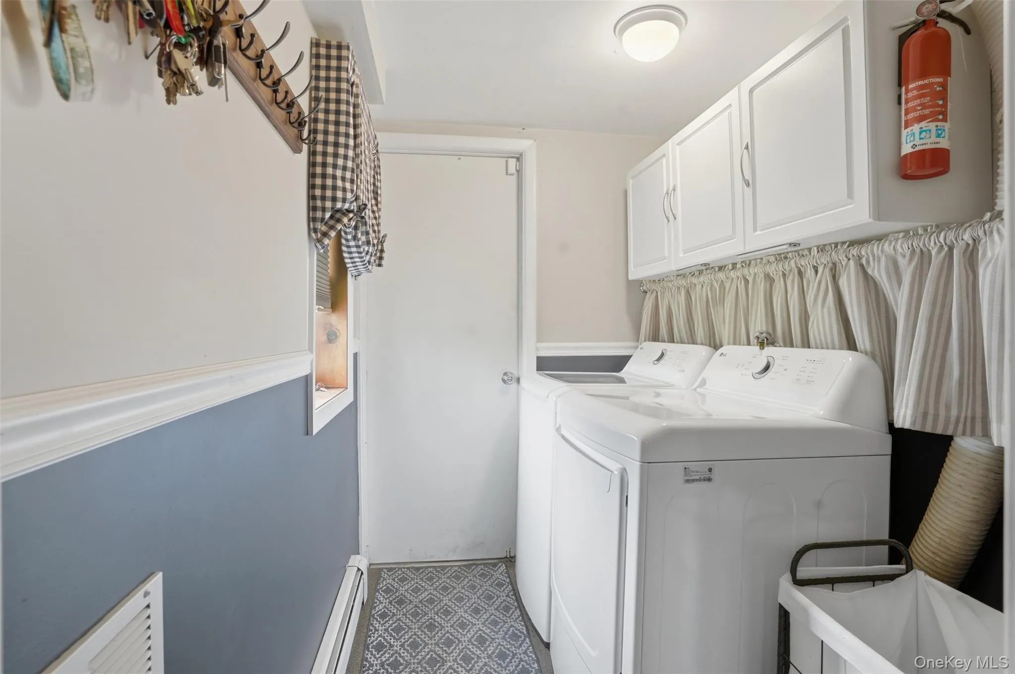 Laundry / mudroom with access to garage Laundry / mudroom with access to garage