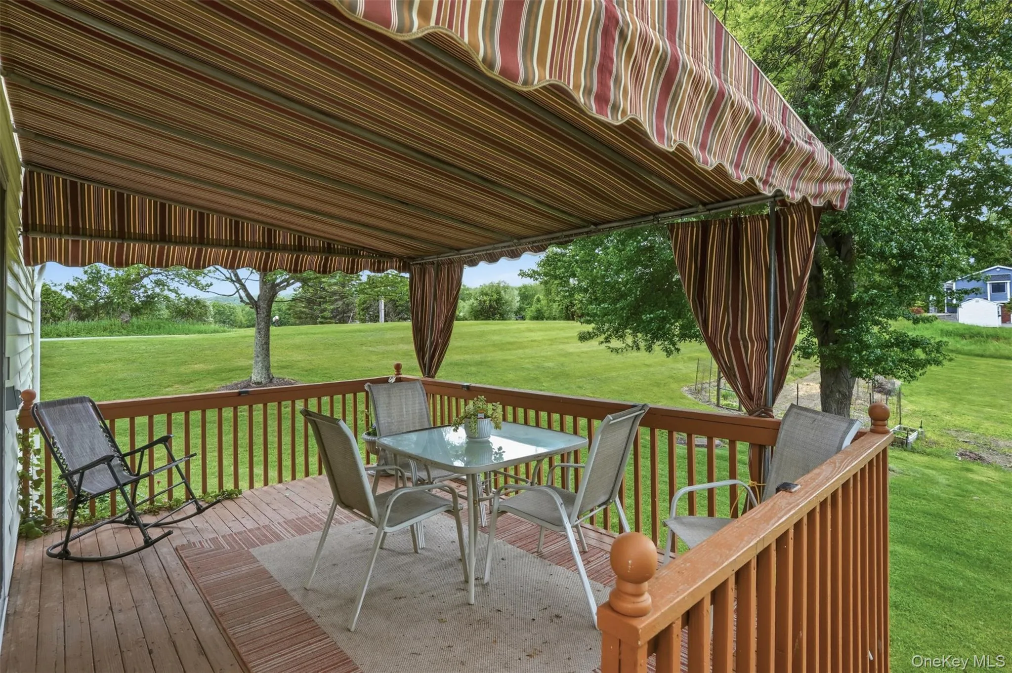 Just off the dining area is a large deck complete with awning. Enjoy al fresco dining in the summer breeze and while listening to the sounds of evening nature Just off the dining area is a large deck complete with awning. Enjoy al fresco dining in the summer breeze and while listening to the sounds of evening nature