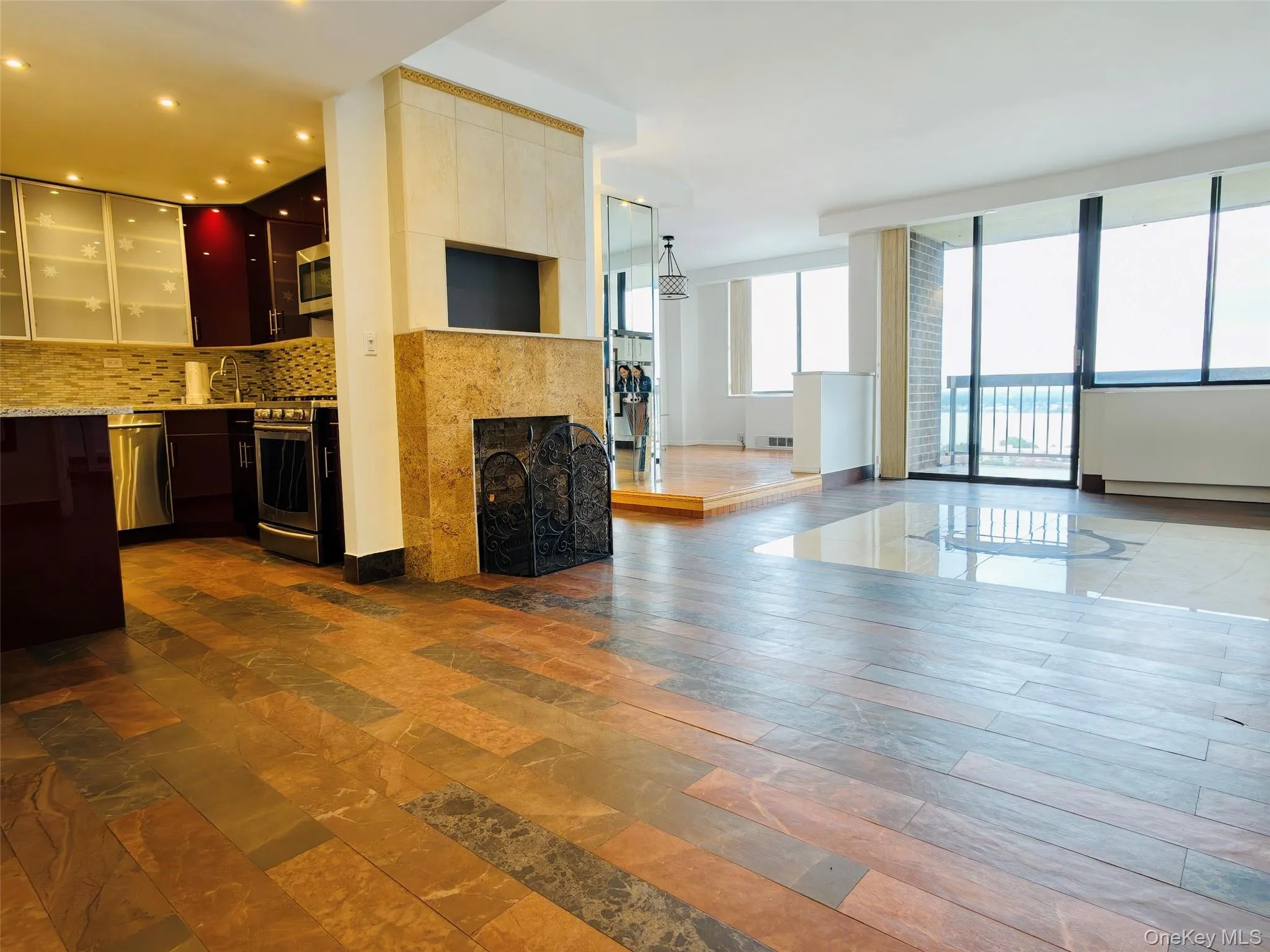 Unfurnished living room with a fireplace Unfurnished living room with a fireplace