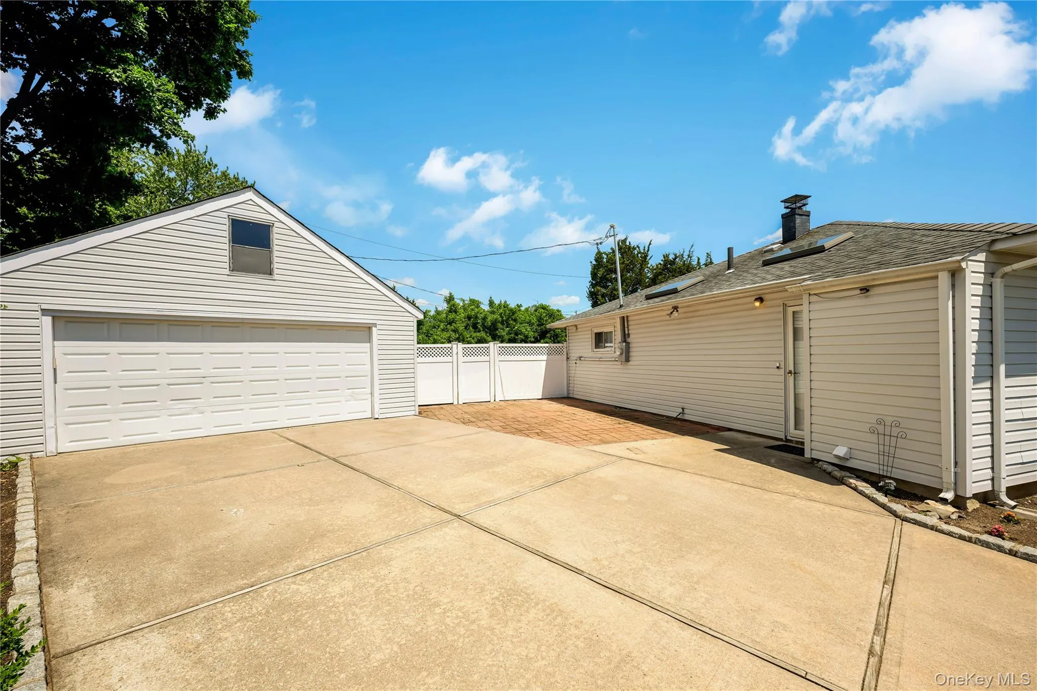 2.5 Car Detached Garage with Side Concrete Patio 2.5 Car Detached Garage with Side Concrete Patio