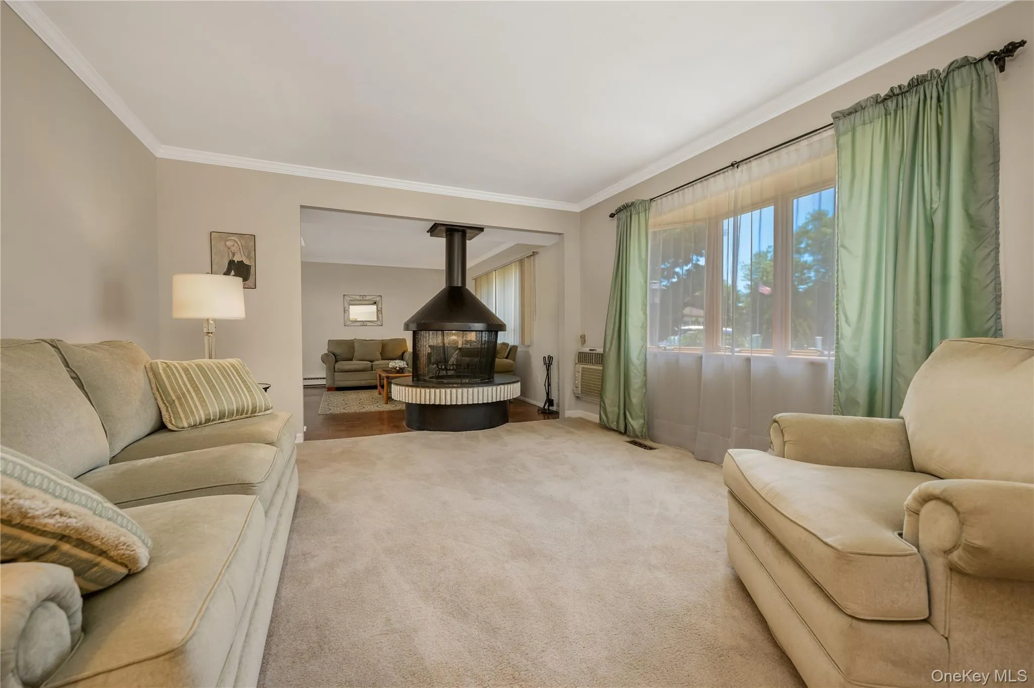 View 1 with Focal Point Wood Burning Fireplace Between Living Room and Sitting Room with Formal Dining Room. View 1 with Focal Point Wood Burning Fireplace Between Living Room and Sitting Room with Formal Dining Room.