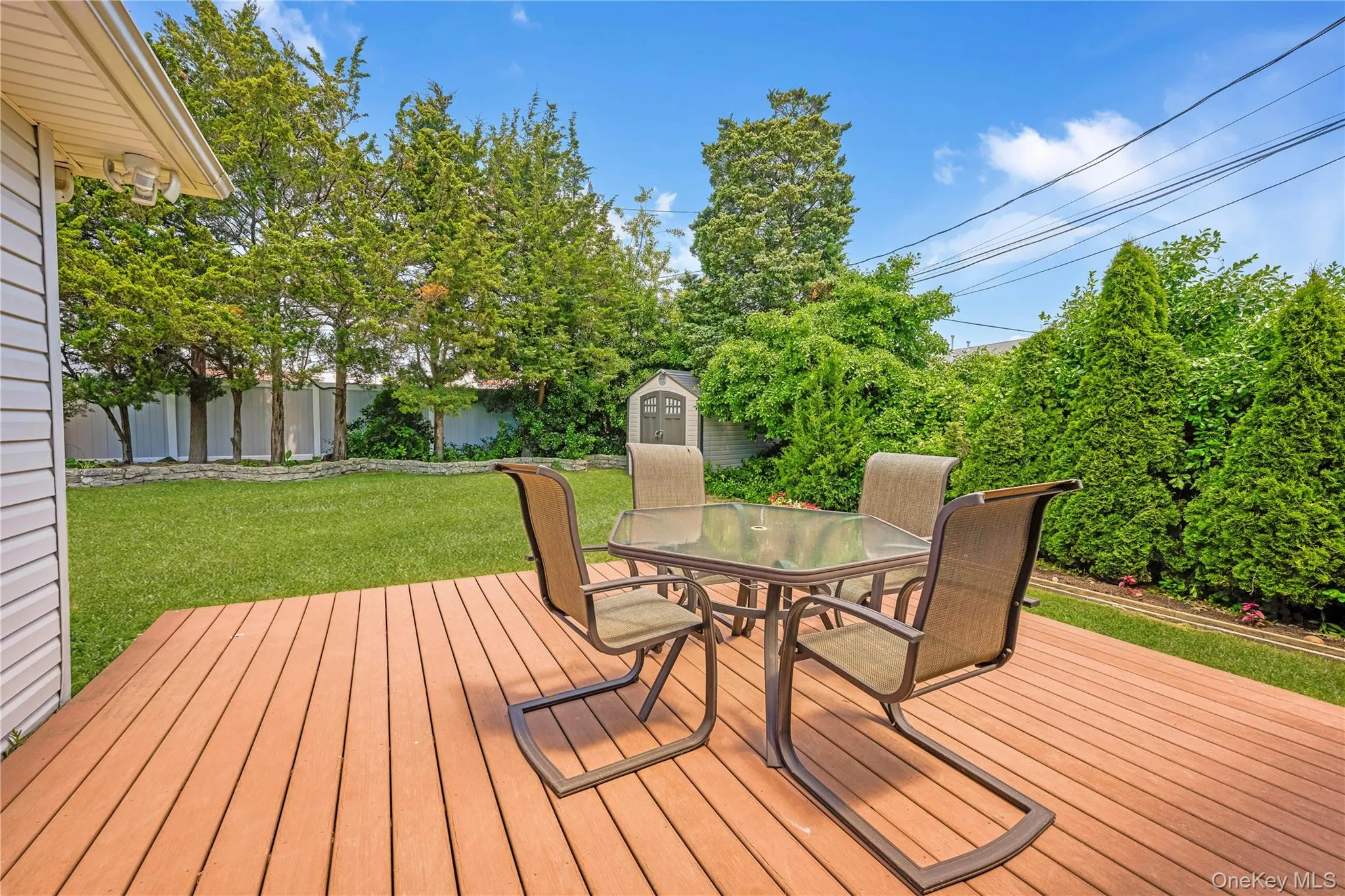 Deck Overlooking Manicured Oversized Property Deck Overlooking Manicured Oversized Property