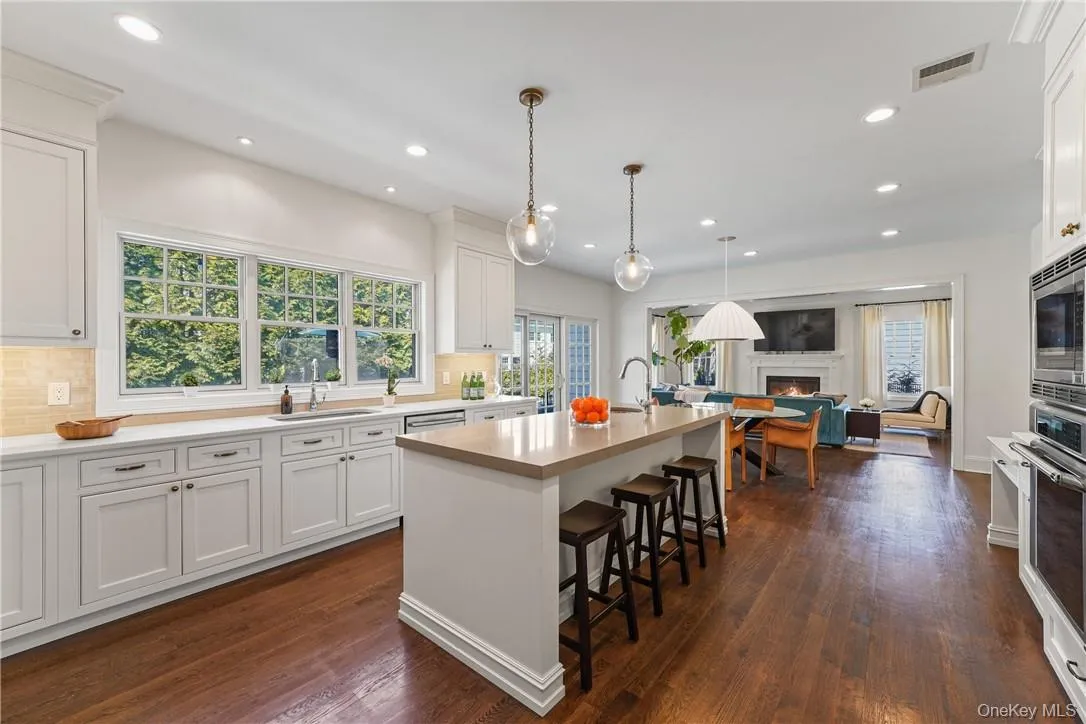 Open concept kitchen family room. Open concept kitchen family room.