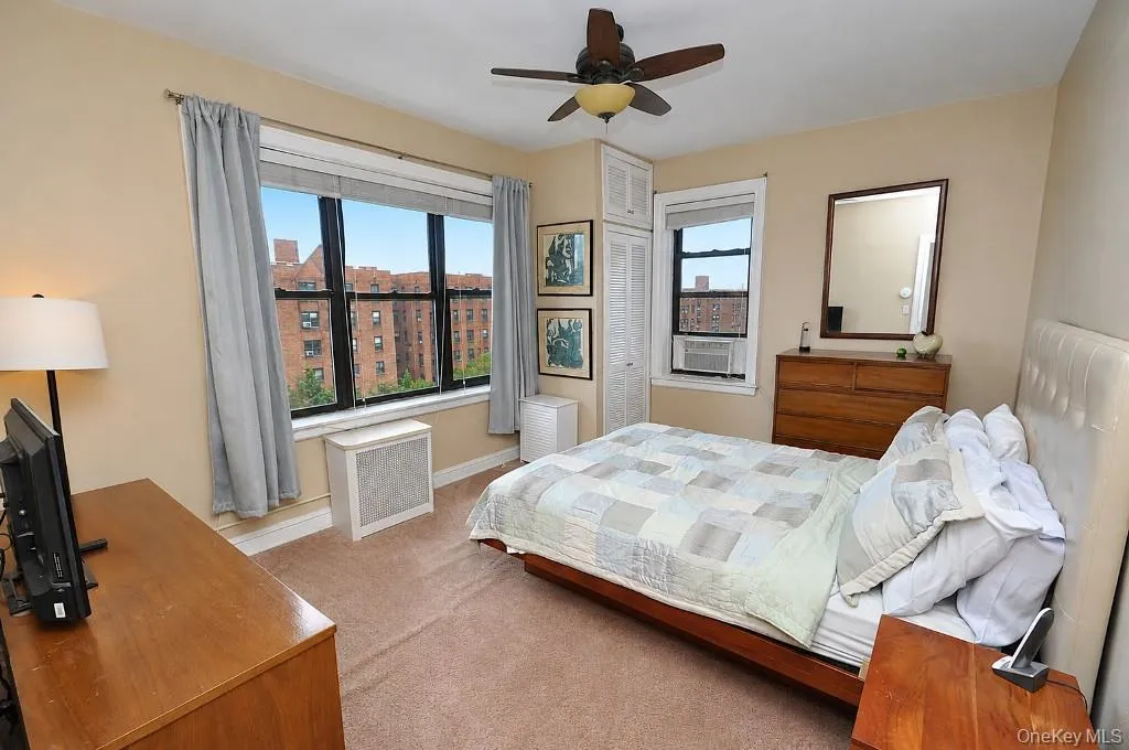 The corner bedroom overlooks tree lined Garth Road and has covered hardwood floors. The bedroom is approx. 14'-9" x 11'-7". The corner bedroom overlooks tree lined Garth Road and has covered hardwood floors. The bedroom is approx. 14'-9" x 11'-7".