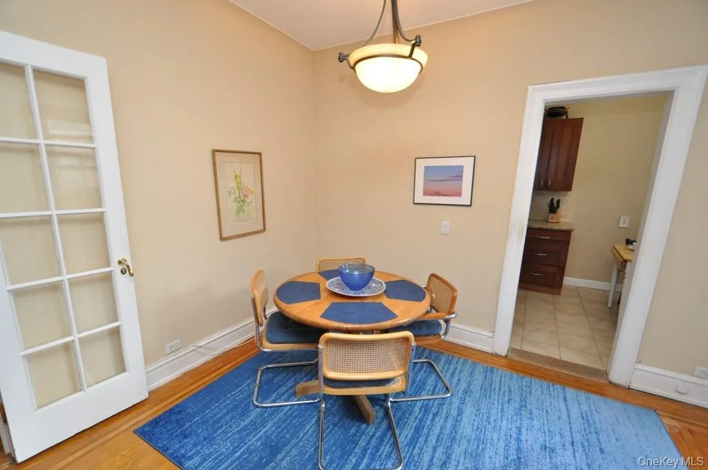 The dining area opens to the entertainment section and is approx 12'- 9" x 7'-0". The dining area opens to the entertainment section and is approx 12'- 9" x 7'-0".