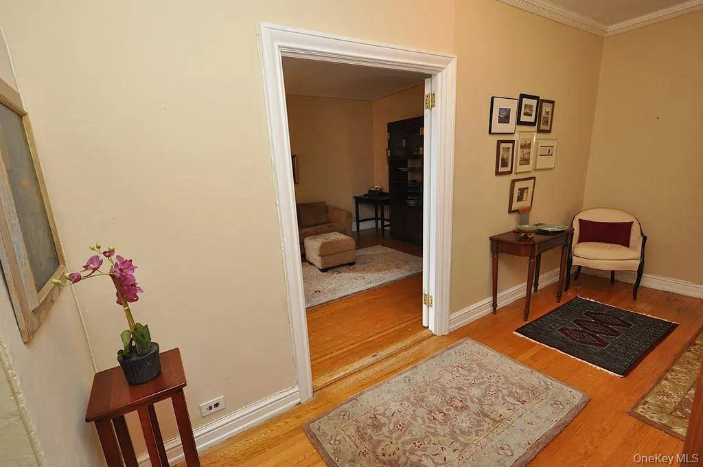 The warm entrance foyer allows you to great your guest and display your fine art. There are French doors leading to the living room and arched doorway leading to the bedroom and bathroom. The entrance foyer can also be set up as a home office. The foyer is approx 15'-11" x 7'-8". The warm entrance foyer allows you to great your guest and display your fine art. There are French doors leading to the living room and arched doorway leading to the bedroom and bathroom. The entrance foyer can also be set up as a home office. The foyer is approx 15'-11" x 7'-8".