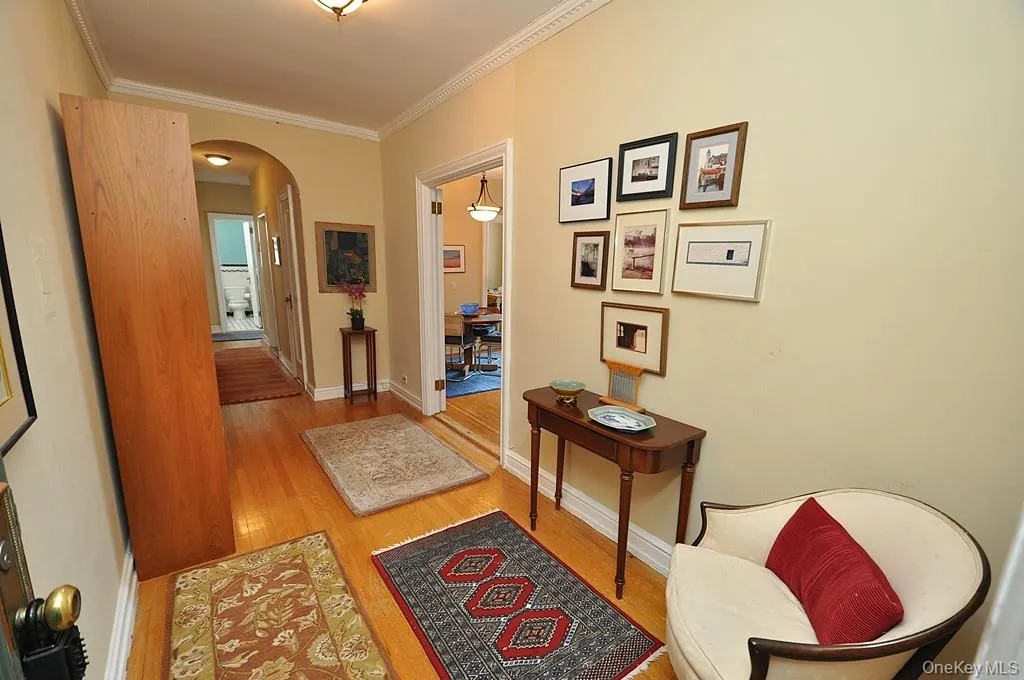 The warm entrance foyer allows you to great your guest and display your fine art. There are French doors leading to the living room and arched doorway leading to the bedroom and bathroom. The entrance foyer can also be set up as a home office. The foyer is approx 15'-11" x 7'-8". The warm entrance foyer allows you to great your guest and display your fine art. There are French doors leading to the living room and arched doorway leading to the bedroom and bathroom. The entrance foyer can also be set up as a home office. The foyer is approx 15'-11" x 7'-8".