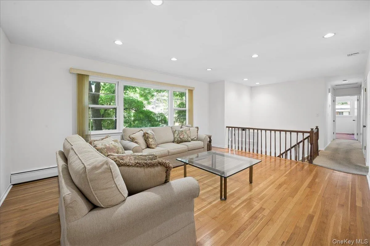 Living room has been freshly painted and features recessed lighting. Living room has been freshly painted and features recessed lighting.