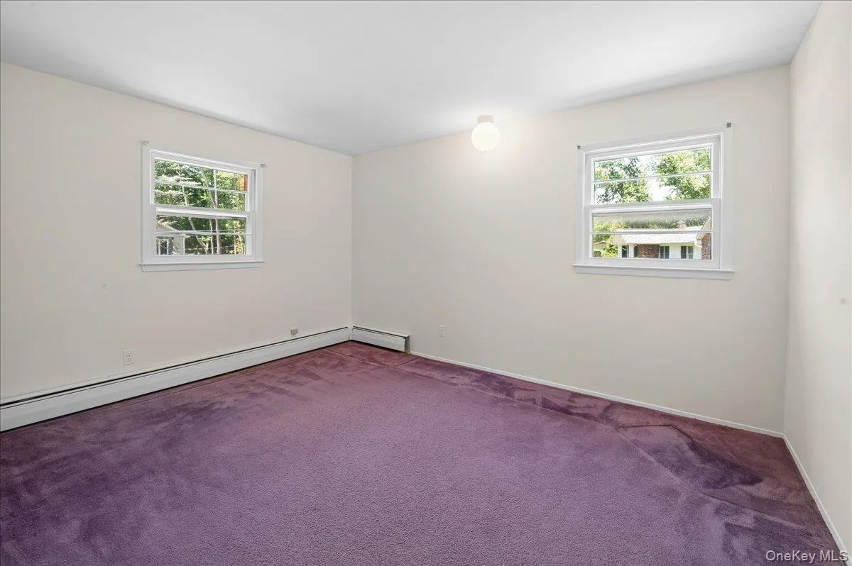 Corner bedroom with two windows. Corner bedroom with two windows.