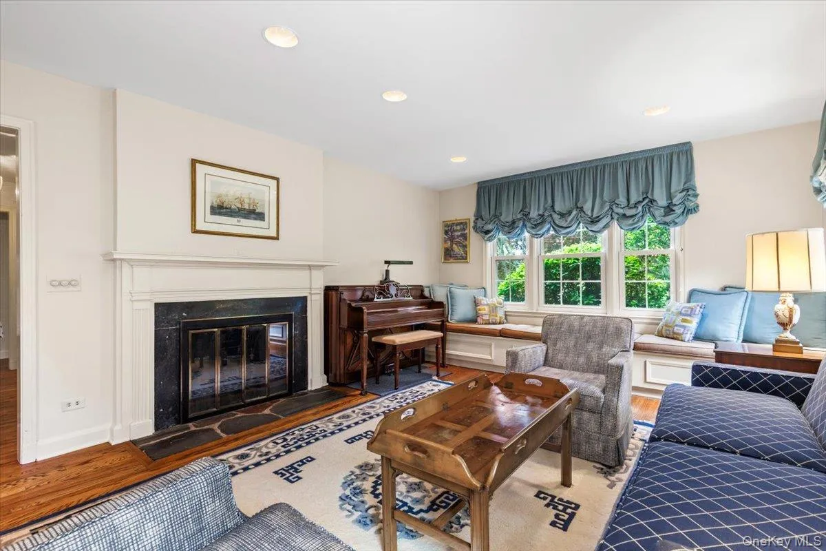 Living room has wood-burning fireplace. Living room has wood-burning fireplace.