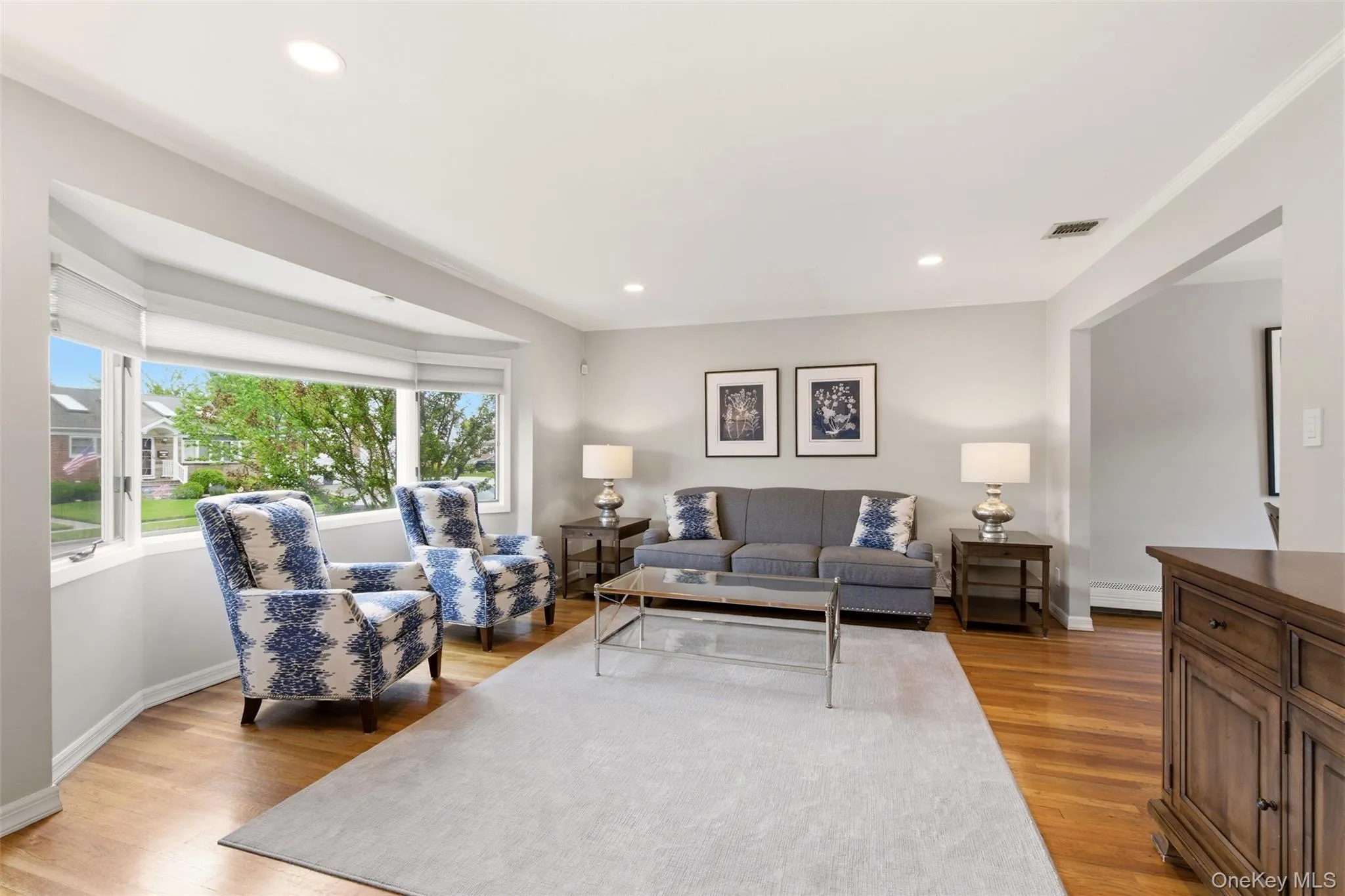 Sunny Living Room W/ Gleaming Hardwood Floors Sunny Living Room W/ Gleaming Hardwood Floors