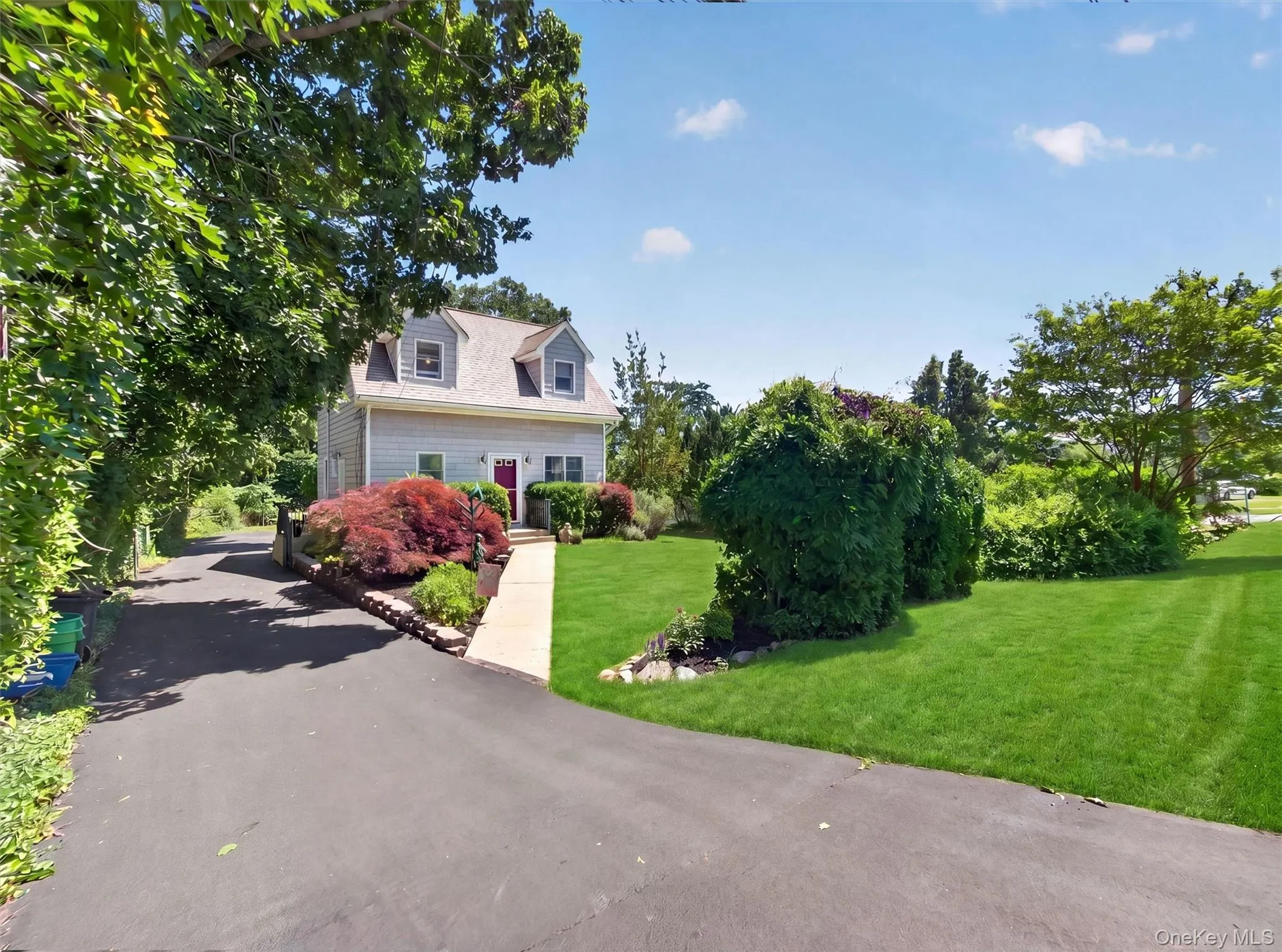 Set way back from Route 304 with a front yard Set way back from Route 304 with a front yard