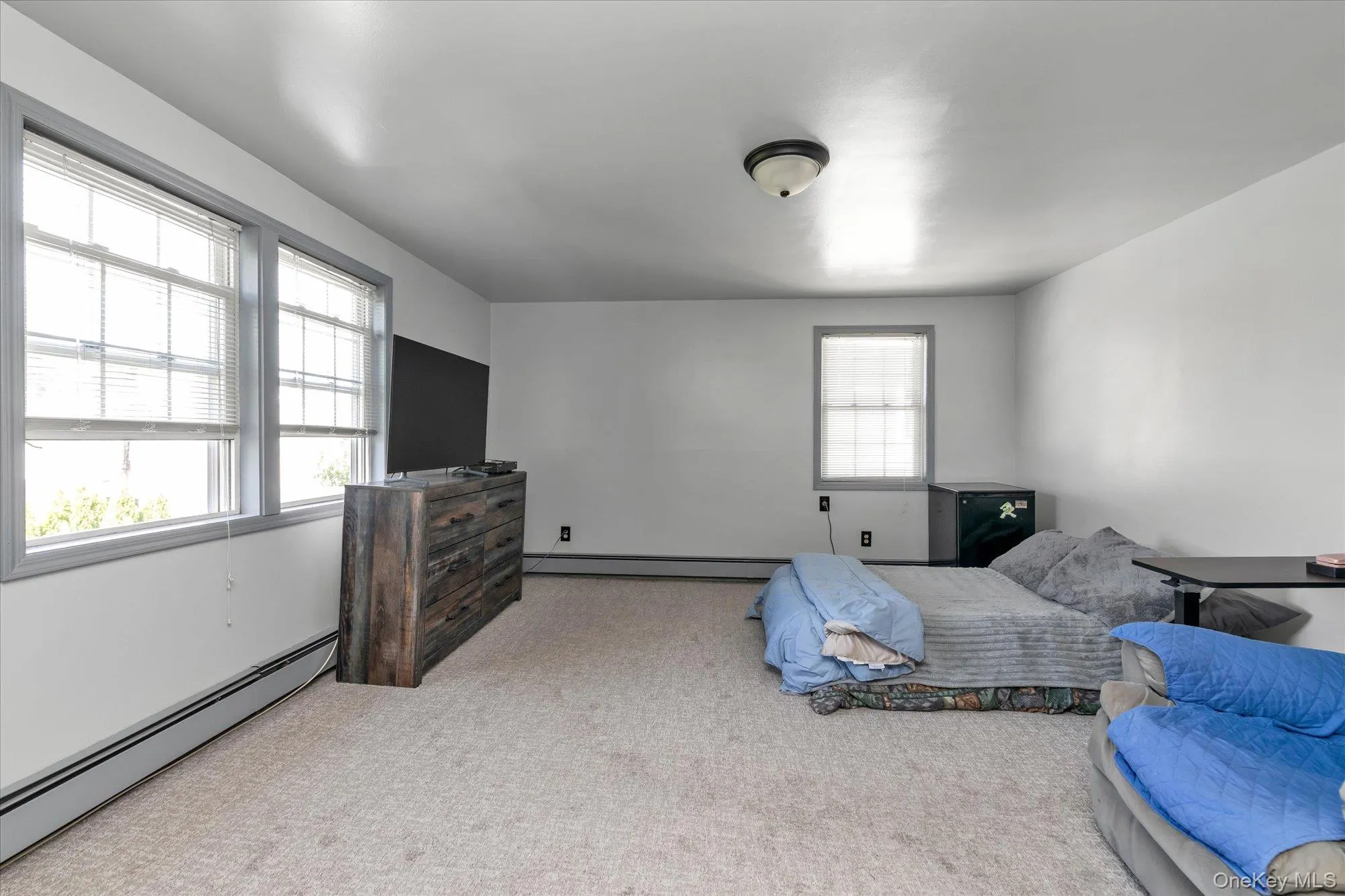 Spacious master bedroom. Light-colored carpet and newly painted. Spacious master bedroom. Light-colored carpet and newly painted.