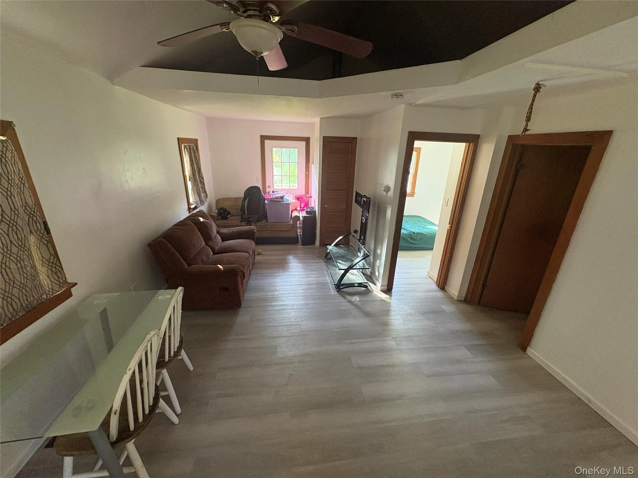 Open living and kitchen area with functional layout. Open living and kitchen area with functional layout.