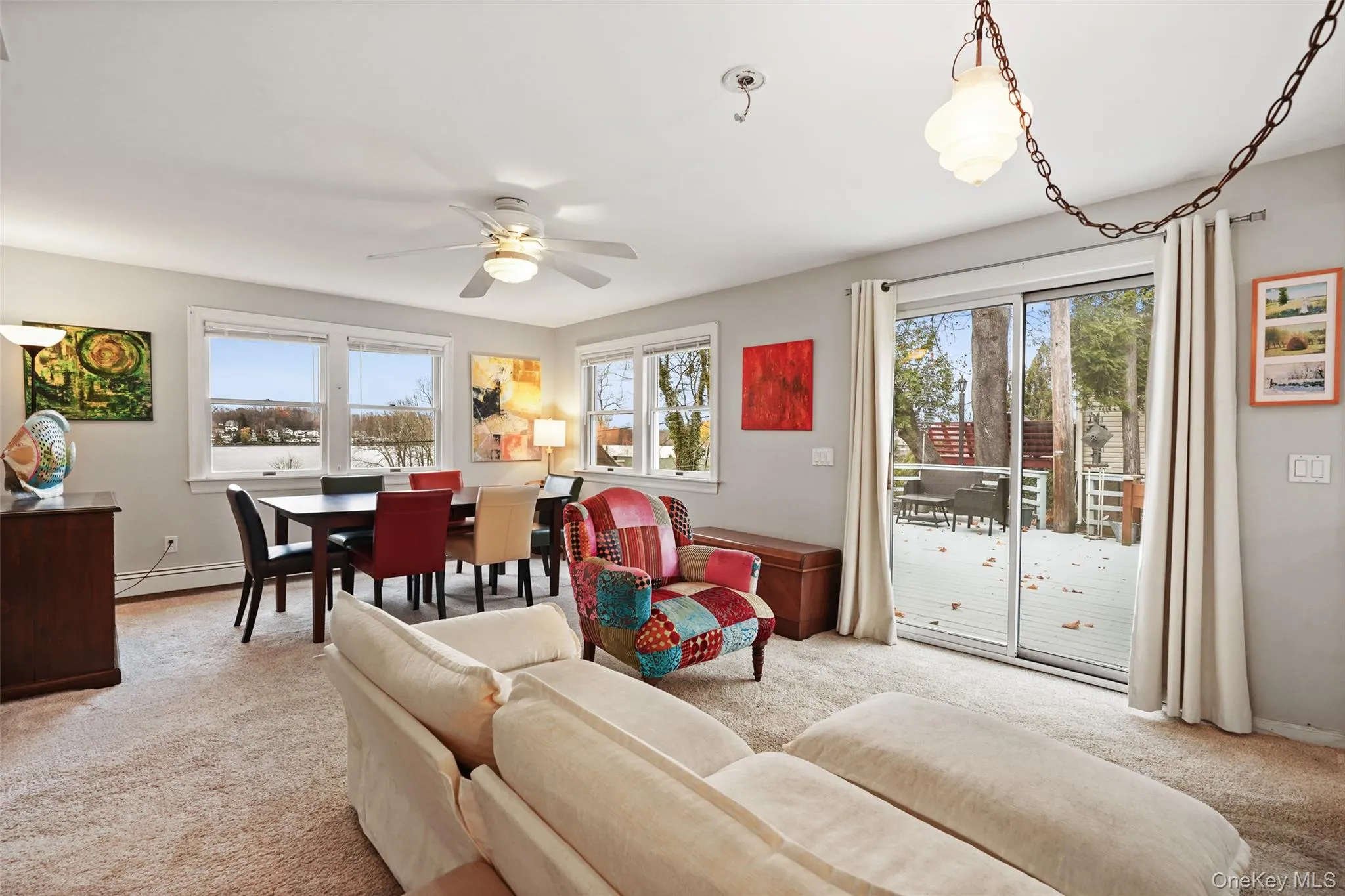 Great room with sliding door and view of Peach Lake Great room with sliding door and view of Peach Lake