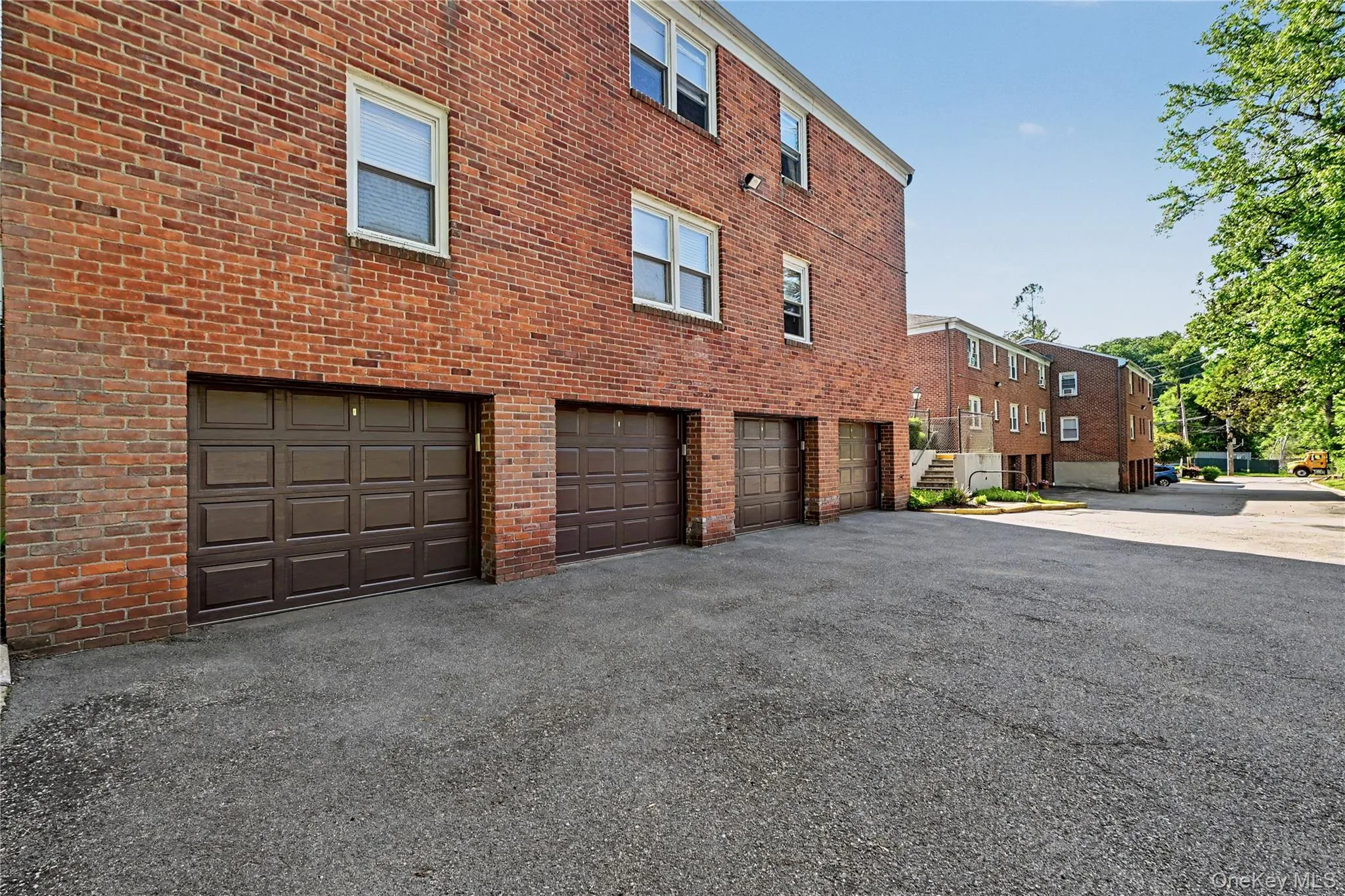 4th door from the left. Stairs up to unit are to the left of the garage door. 4th door from the left. Stairs up to unit are to the left of the garage door.