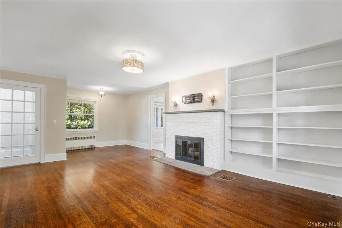 Living room with built in shelves and reading corner Living room with built in shelves and reading corner