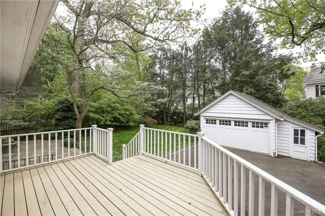 Large deck overlooks the backyard Large deck overlooks the backyard