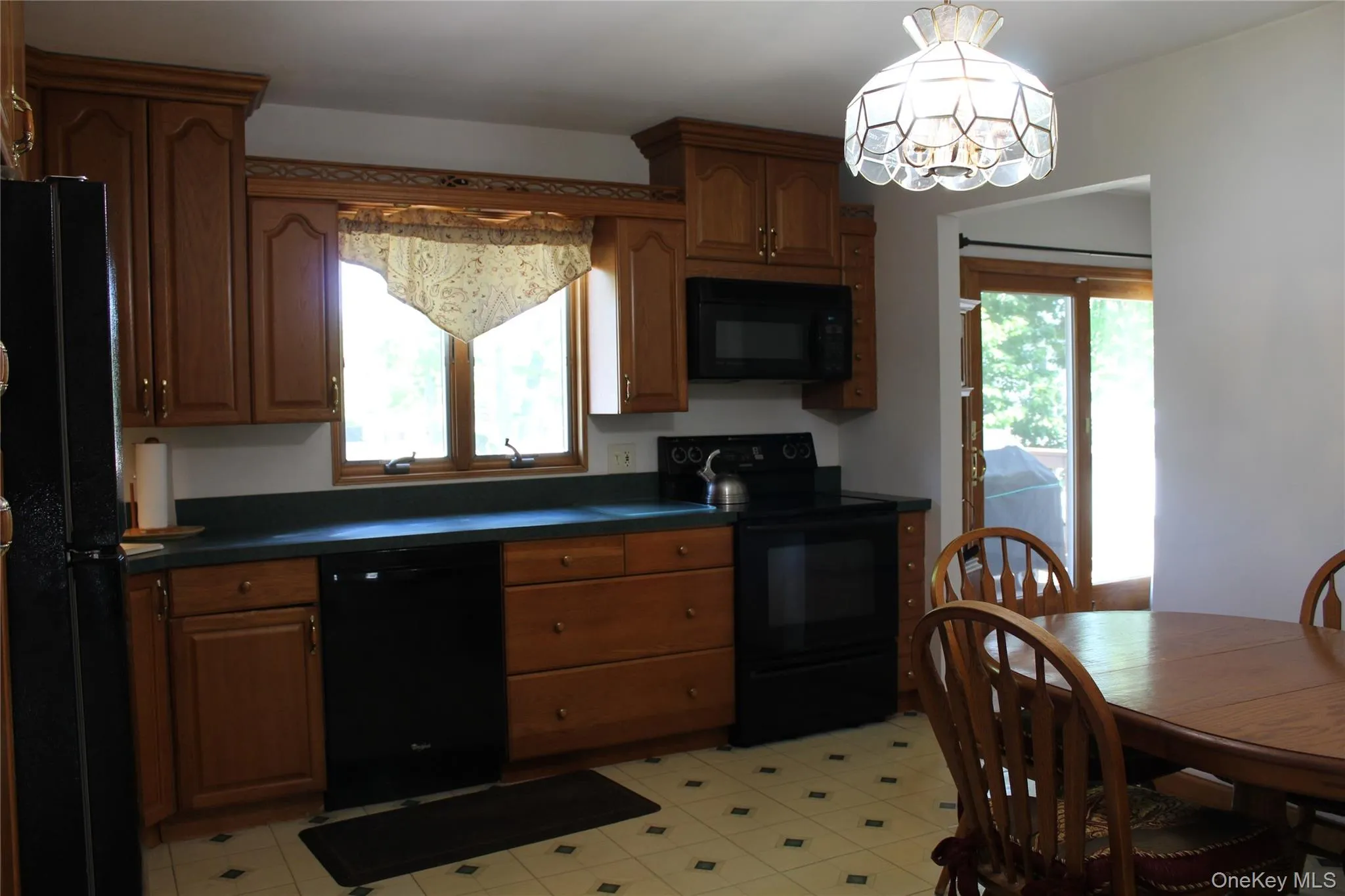 Eat in Kitchen, New 2026 Refrig. Updated Electric Range and Dishwasher. Built in Microwave. Anderson Window. Oak Cabinets. Eat in Kitchen, New 2026 Refrig. Updated Electric Range and Dishwasher. Built in Microwave. Anderson Window. Oak Cabinets.