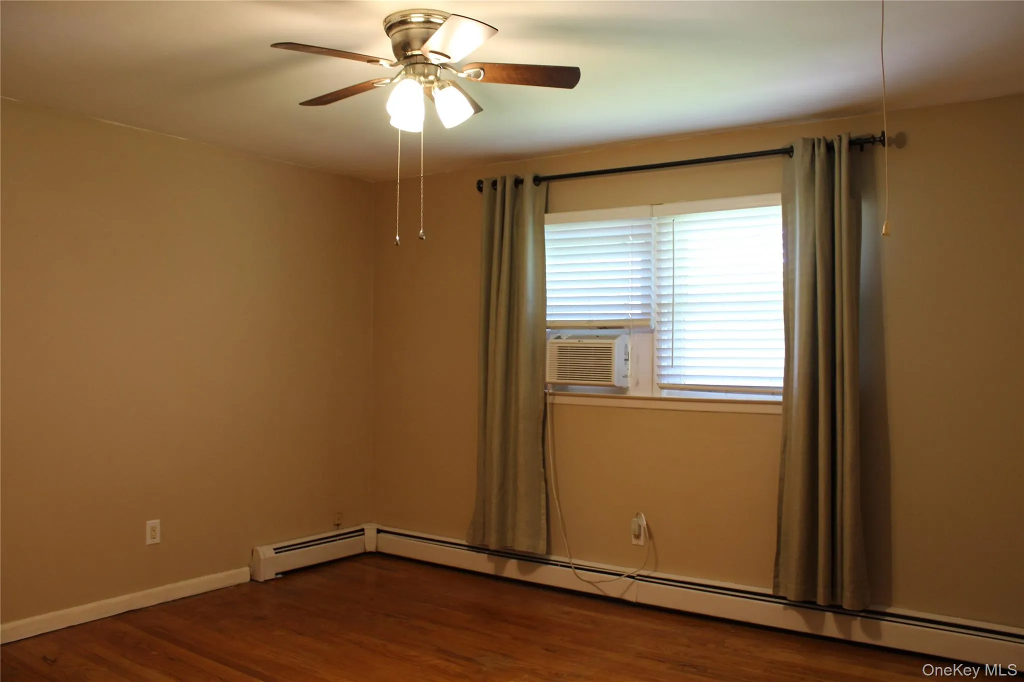 Wood Floors, Ceiling Fan and Closet Wood Floors, Ceiling Fan and Closet