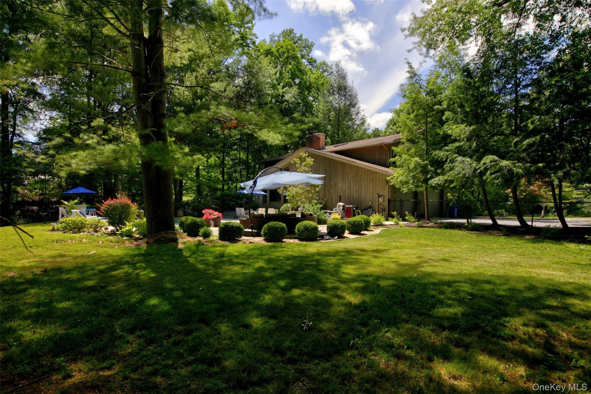 Enjoy the peaceful tranquility of this private backyard sanctuary, where mature trees, lush landscaping, and resort-style amenities create the perfect setting for relaxation, recreation, and outdoor entertaining. Enjoy the peaceful tranquility of this private backyard sanctuary, where mature trees, lush landscaping, and resort-style amenities create the perfect setting for relaxation, recreation, and outdoor entertaining.