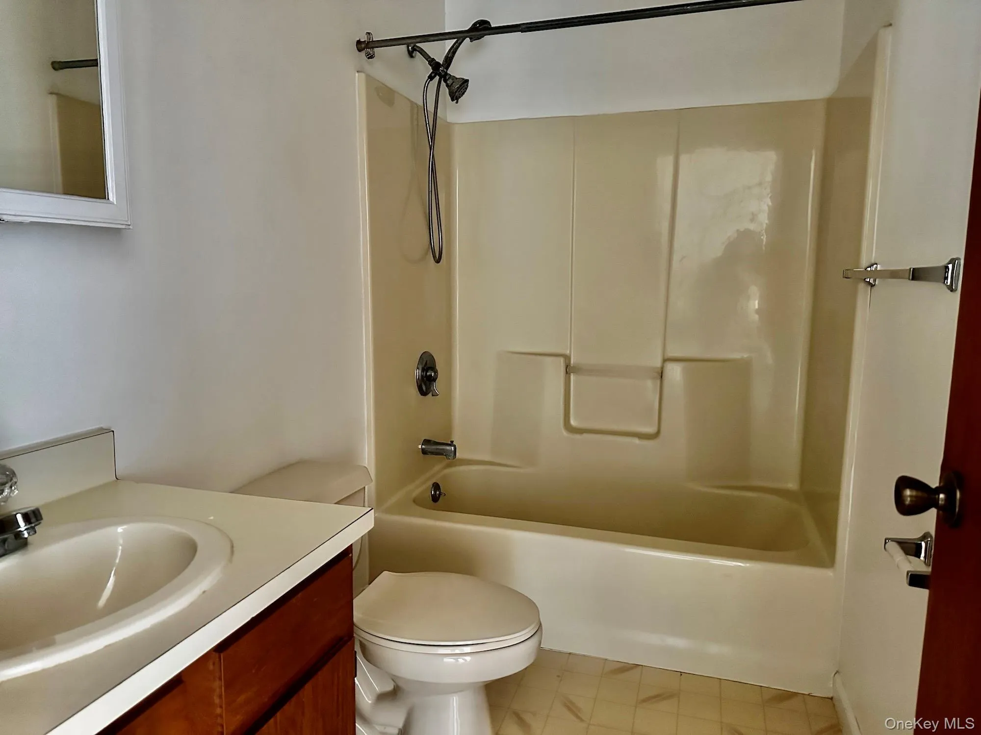 Full bath featuring shower / tub combination and vanity Full bath featuring shower / tub combination and vanity