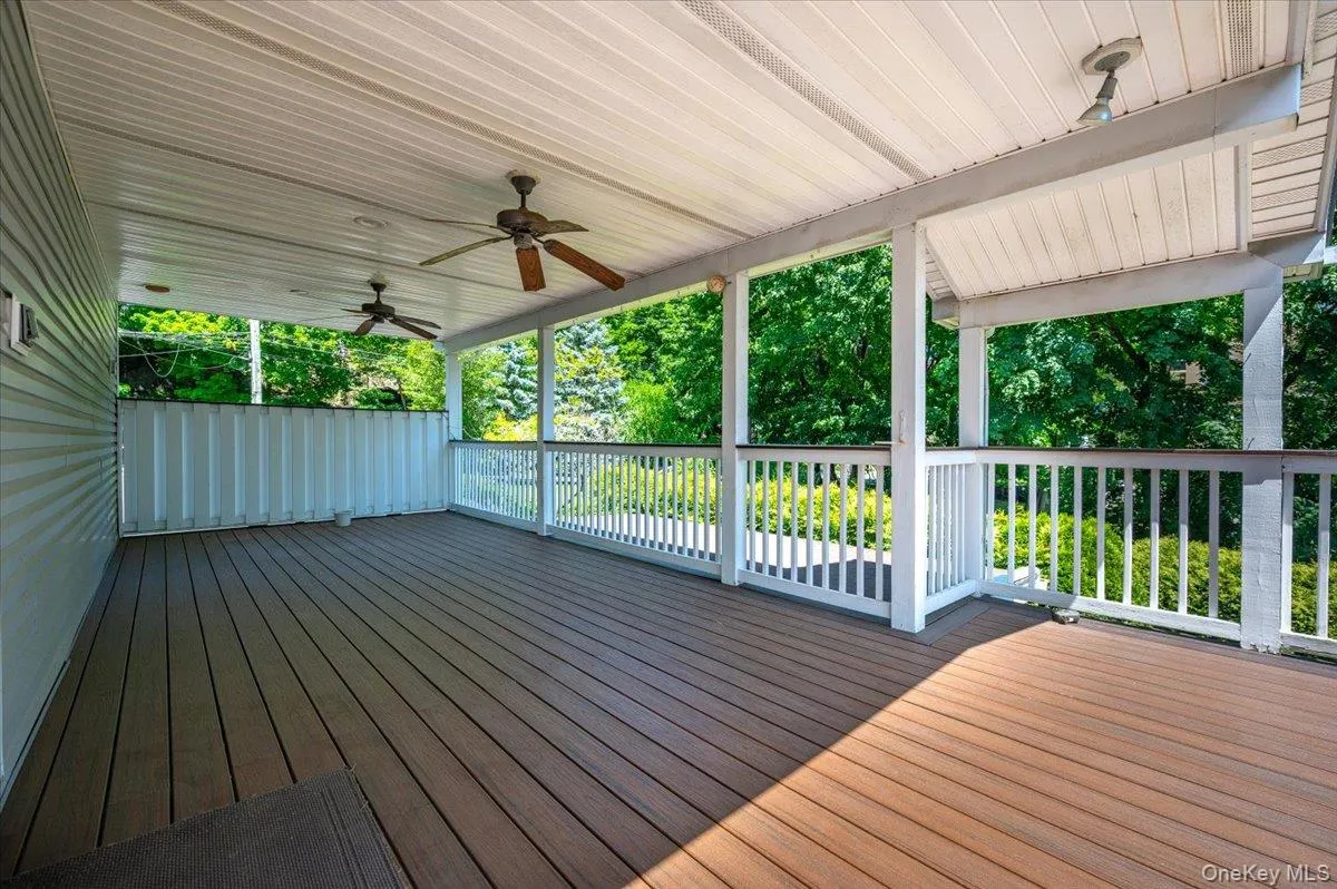 Oversized, covered patio off kitchen Oversized, covered patio off kitchen