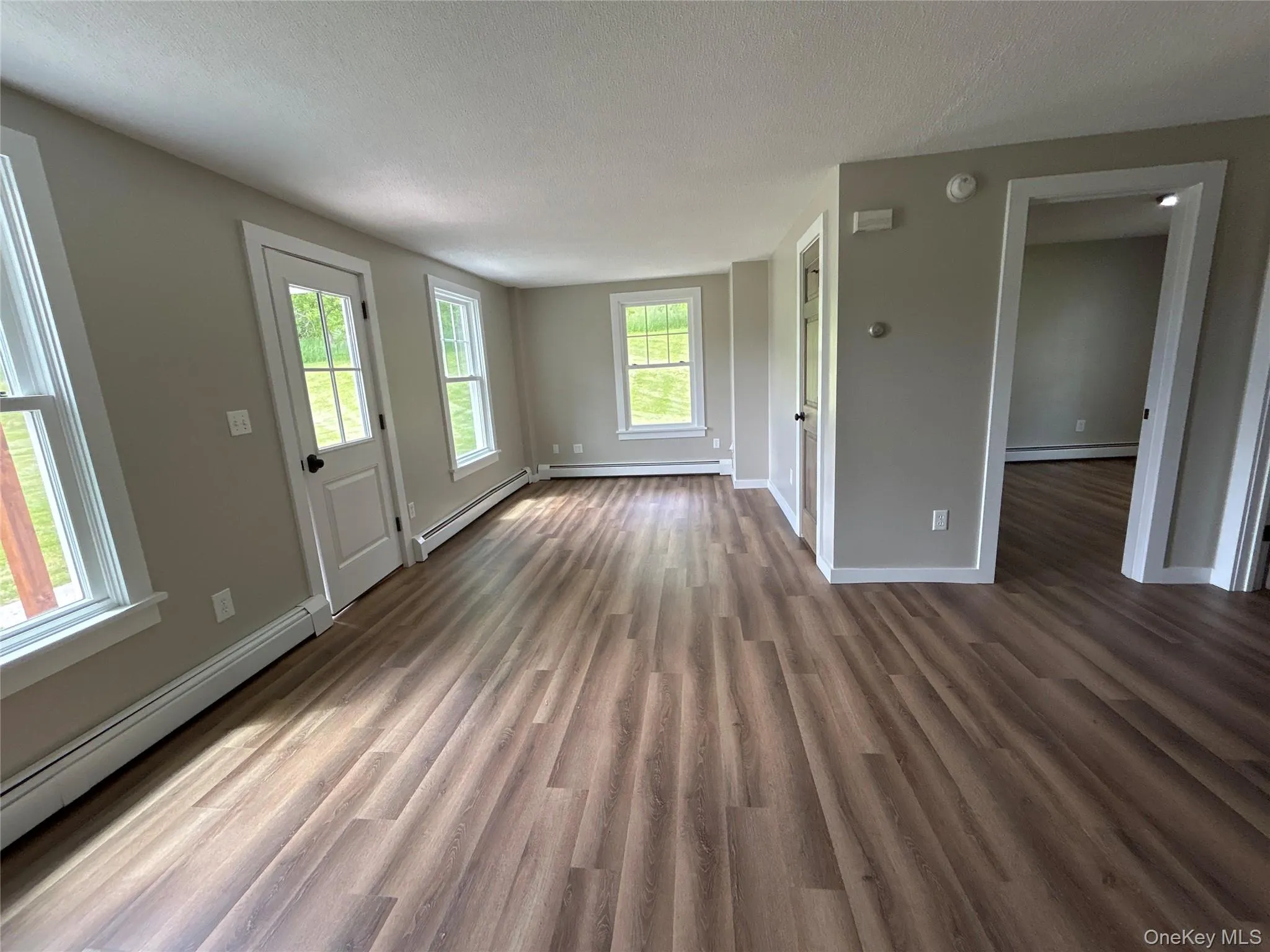 View from dining room into living room Apartment #1 first floor View from dining room into living room Apartment #1 first floor