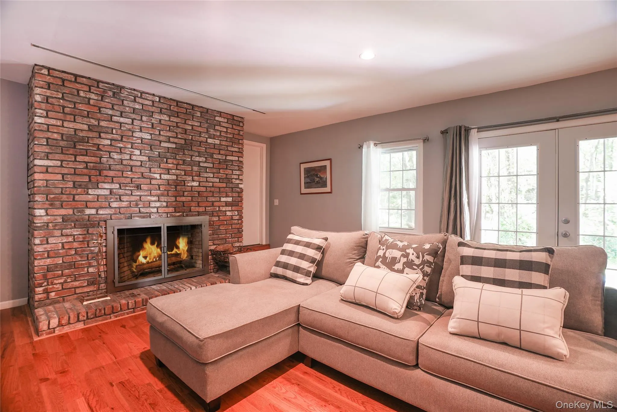 Above grade lower level w/ 2nd wood burning fireplace. Above grade lower level w/ 2nd wood burning fireplace.