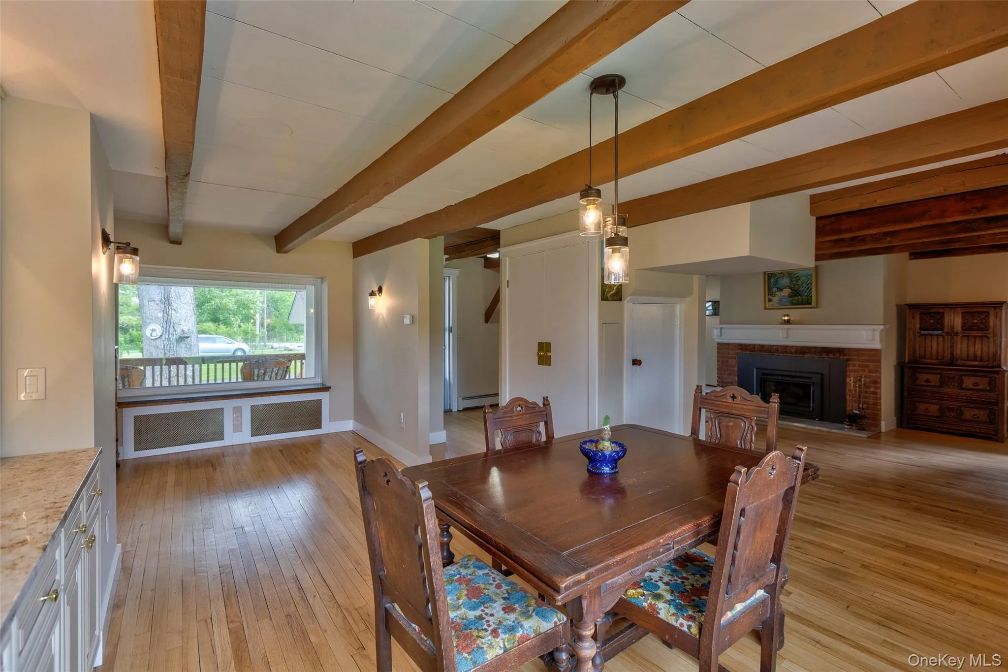 dining room with large picture window. Watch the seasons change! dining room with large picture window. Watch the seasons change!