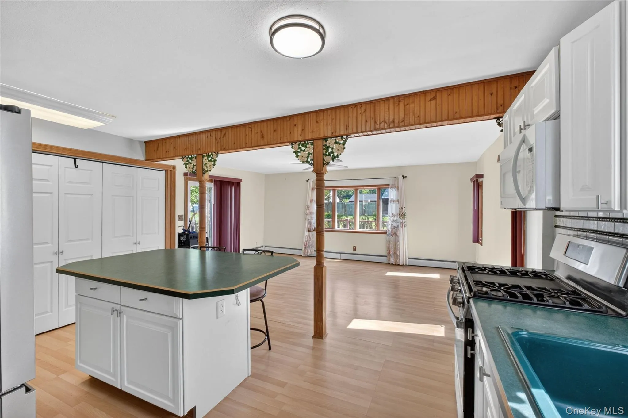 Kitchen opens to dining room expansion Kitchen opens to dining room expansion
