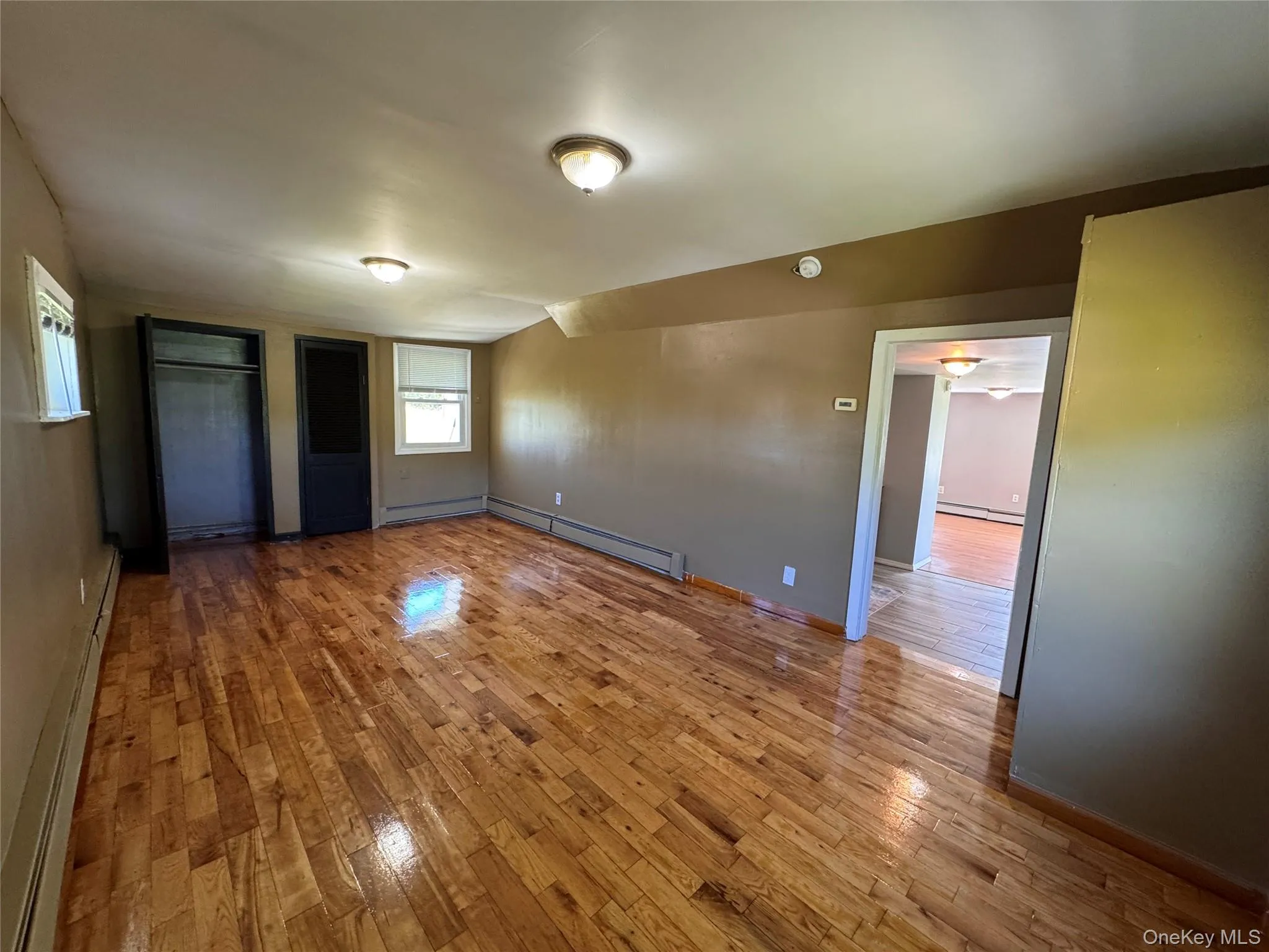 Den with three storage closets. Den with three storage closets.