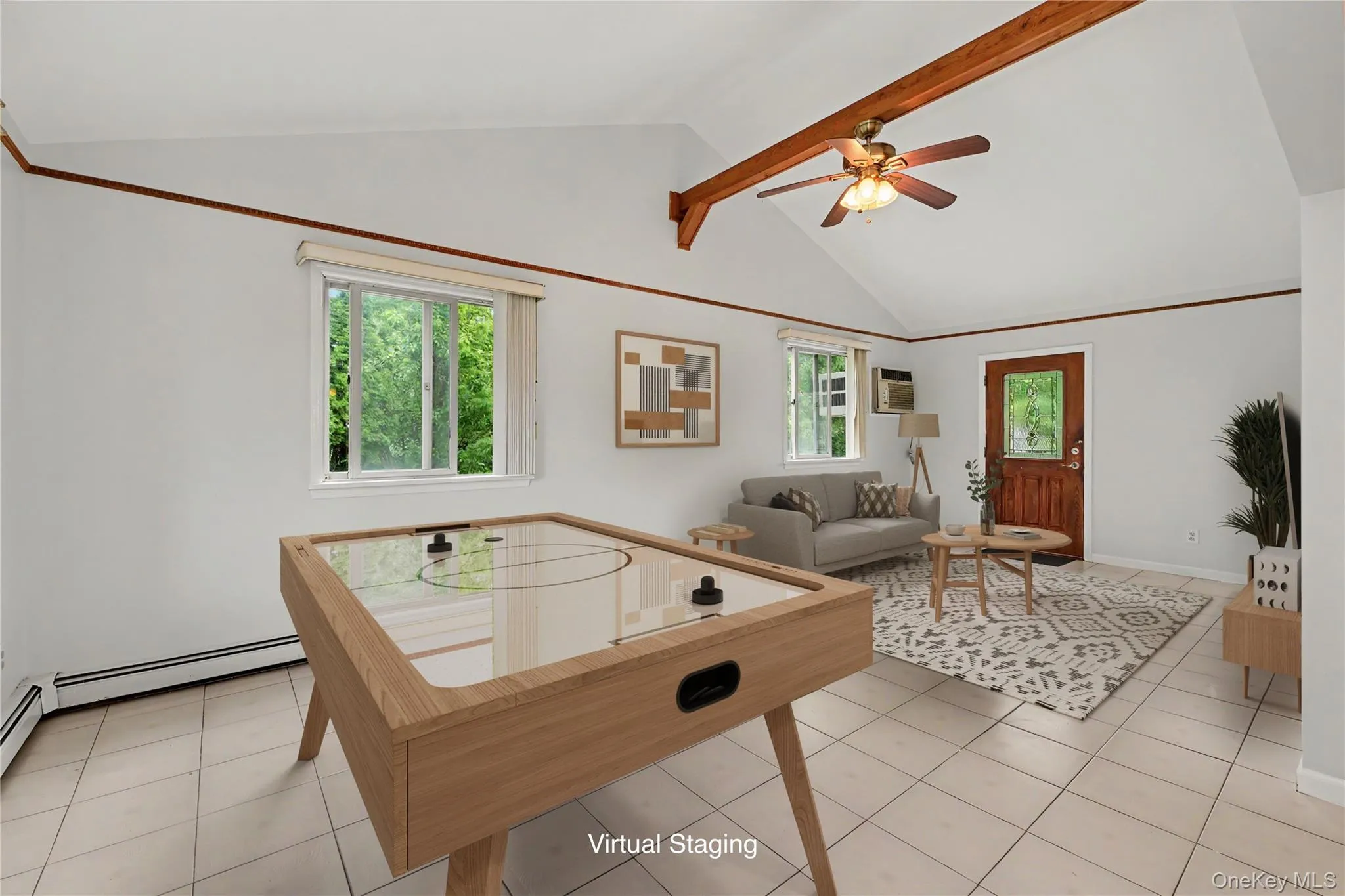 Virtually staged. Vaulted ceiling with exposed wood beams, ceiling fan, and light tile flooring. Door leads to private patio. Virtually staged. Vaulted ceiling with exposed wood beams, ceiling fan, and light tile flooring. Door leads to private patio.