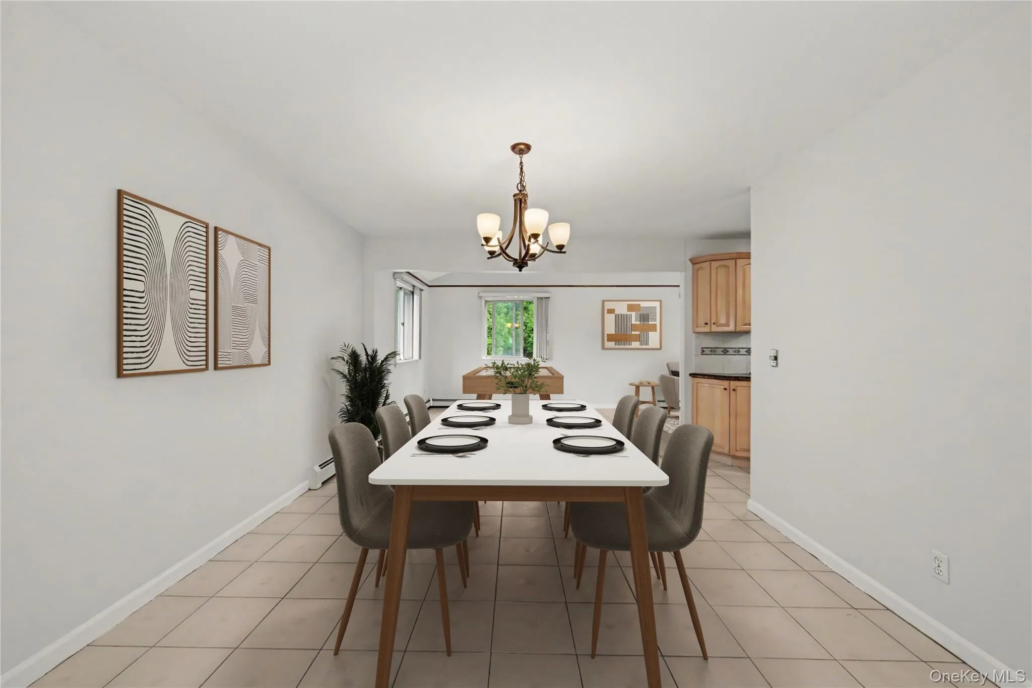 Virtually staged spacious dining area featuring neutral wall tones and tile flooring Virtually staged spacious dining area featuring neutral wall tones and tile flooring
