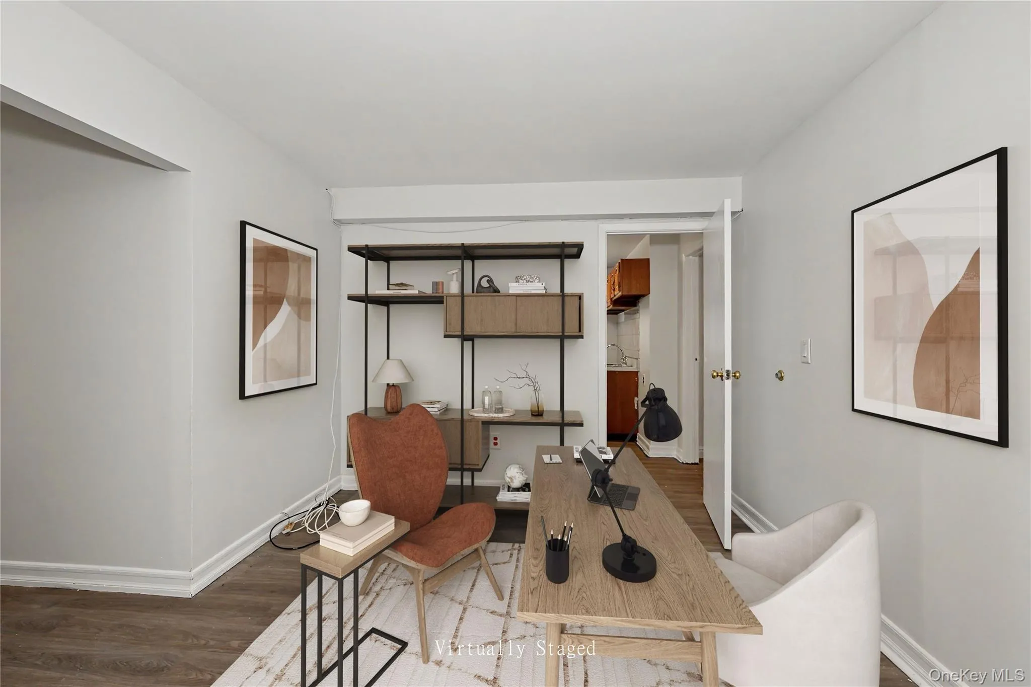 Virtually staged Room with light neutral wall paint and wood-finish flooring. Virtually staged Room with light neutral wall paint and wood-finish flooring.