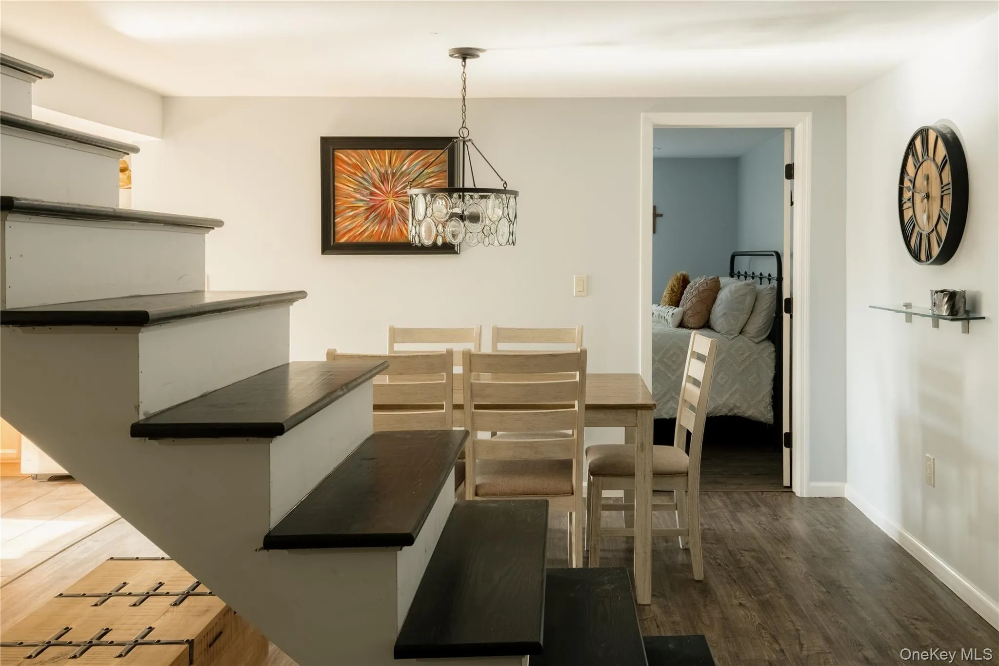 The 2 BR apartment has a separate entrance and stairs down from the kitchen. The 2 BR apartment has a separate entrance and stairs down from the kitchen.