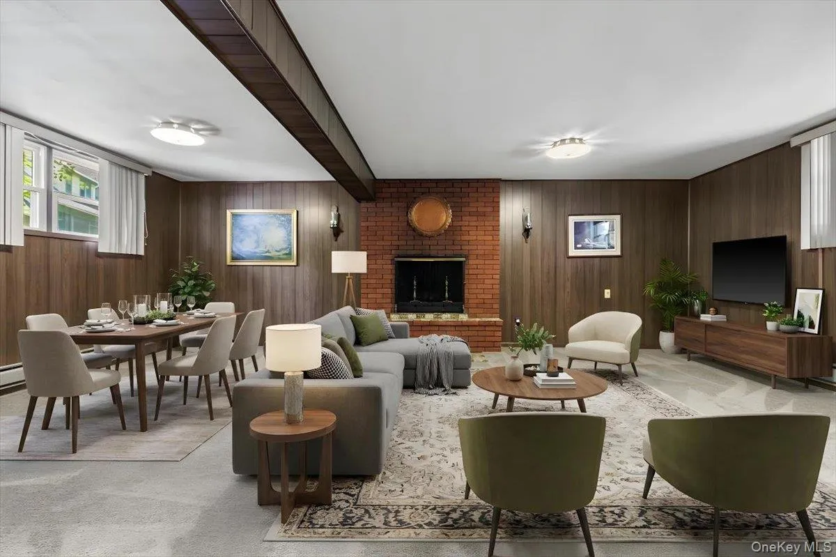 A spacious living area with room for both relaxing and dining, offering an easy, comfortable layout. A spacious living area with room for both relaxing and dining, offering an easy, comfortable layout.
