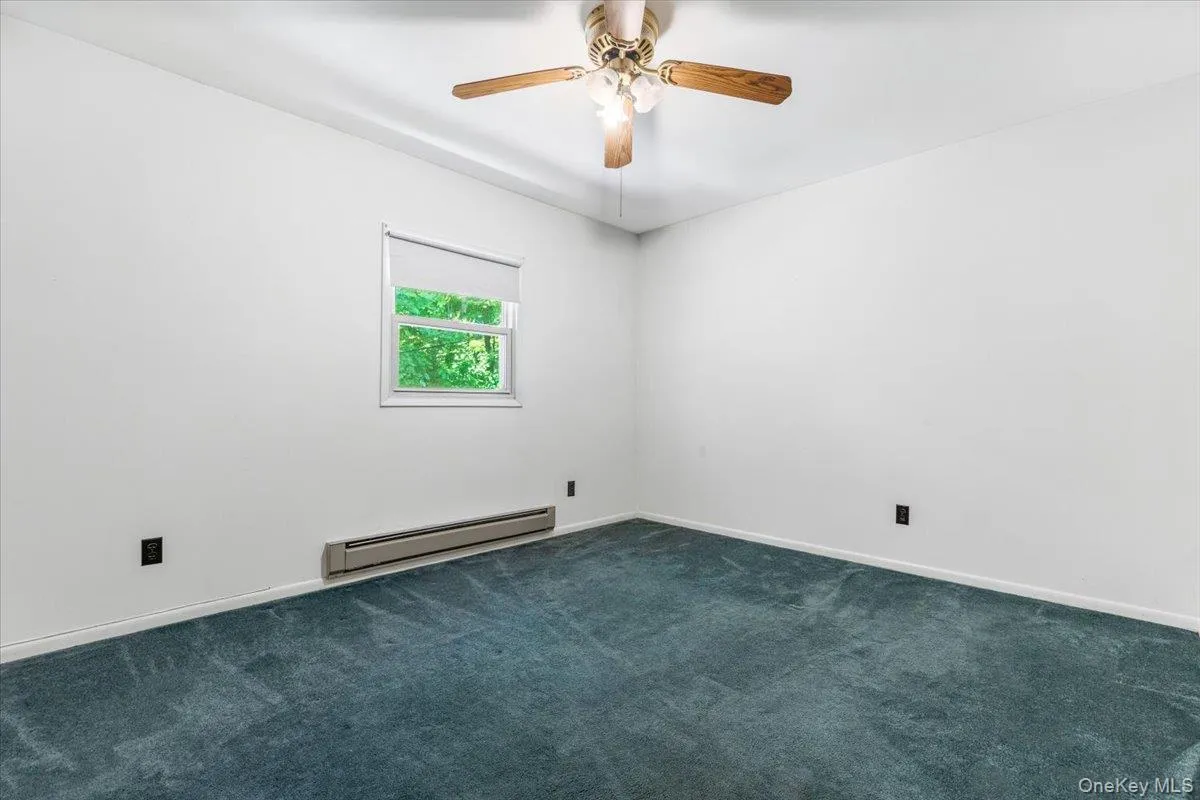 An additional bedroom offering privacy, natural light, and everyday comfort. An additional bedroom offering privacy, natural light, and everyday comfort.