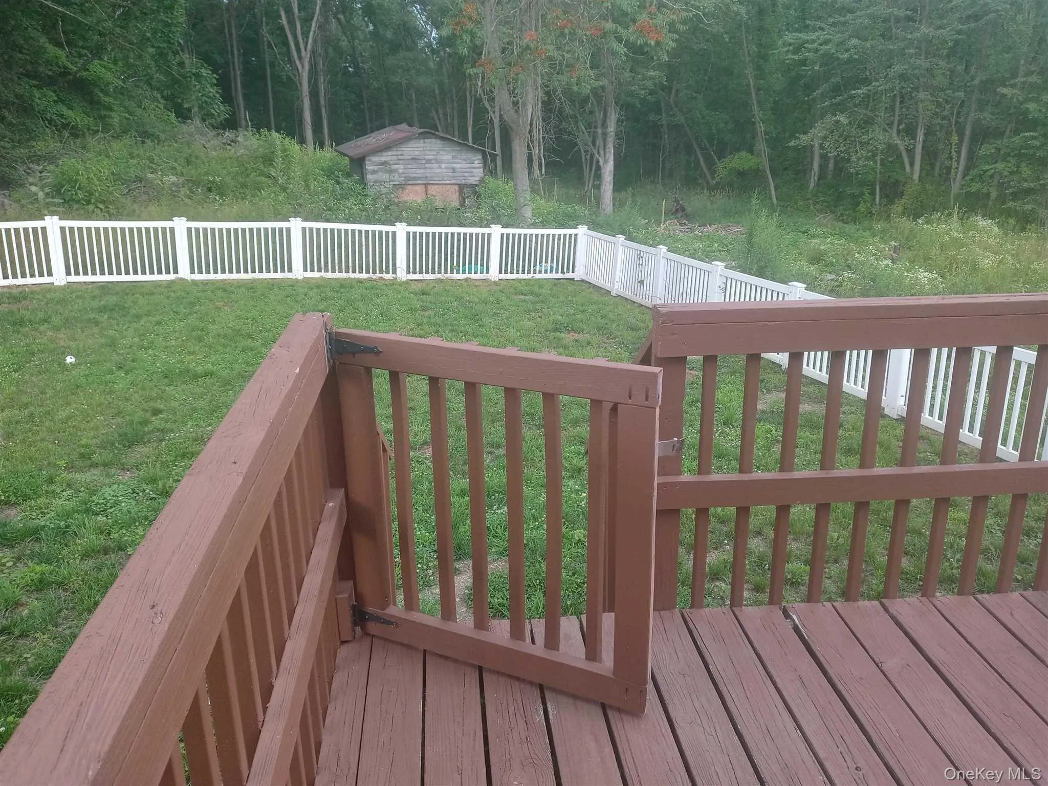 Deck has gate to yard Deck has gate to yard